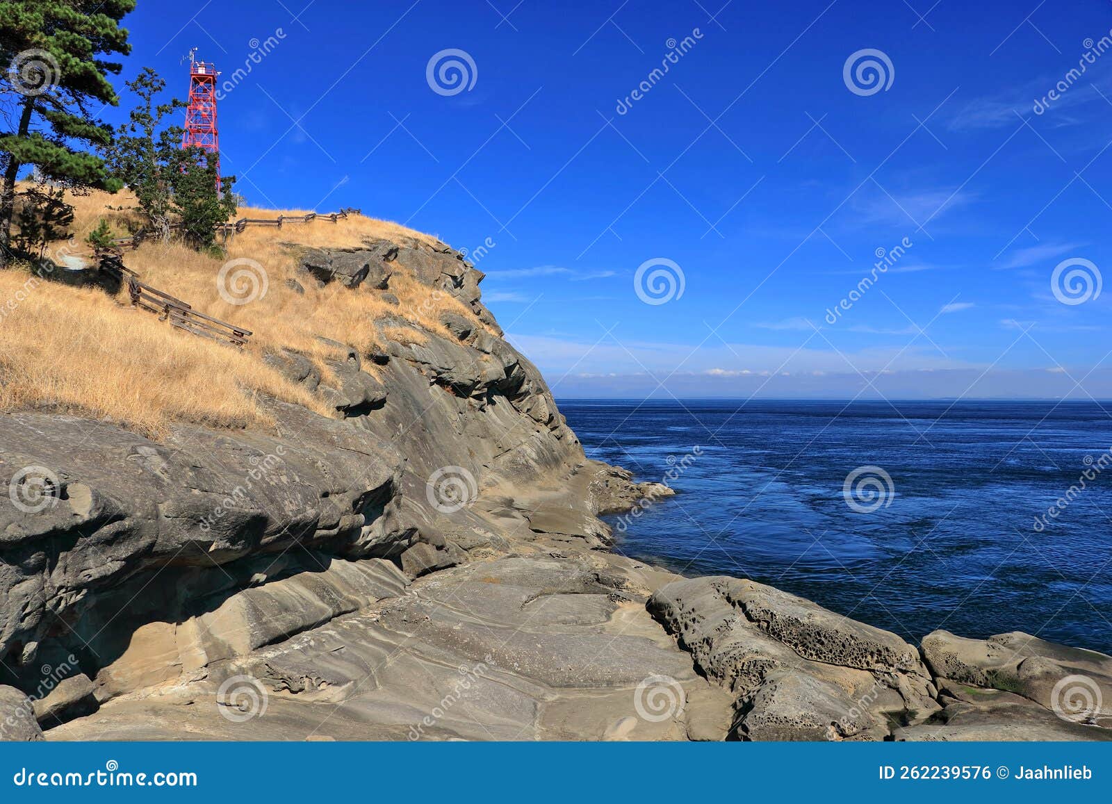 east point light station on sandstone cliff on saturna island, gulf islands national park, british columbia