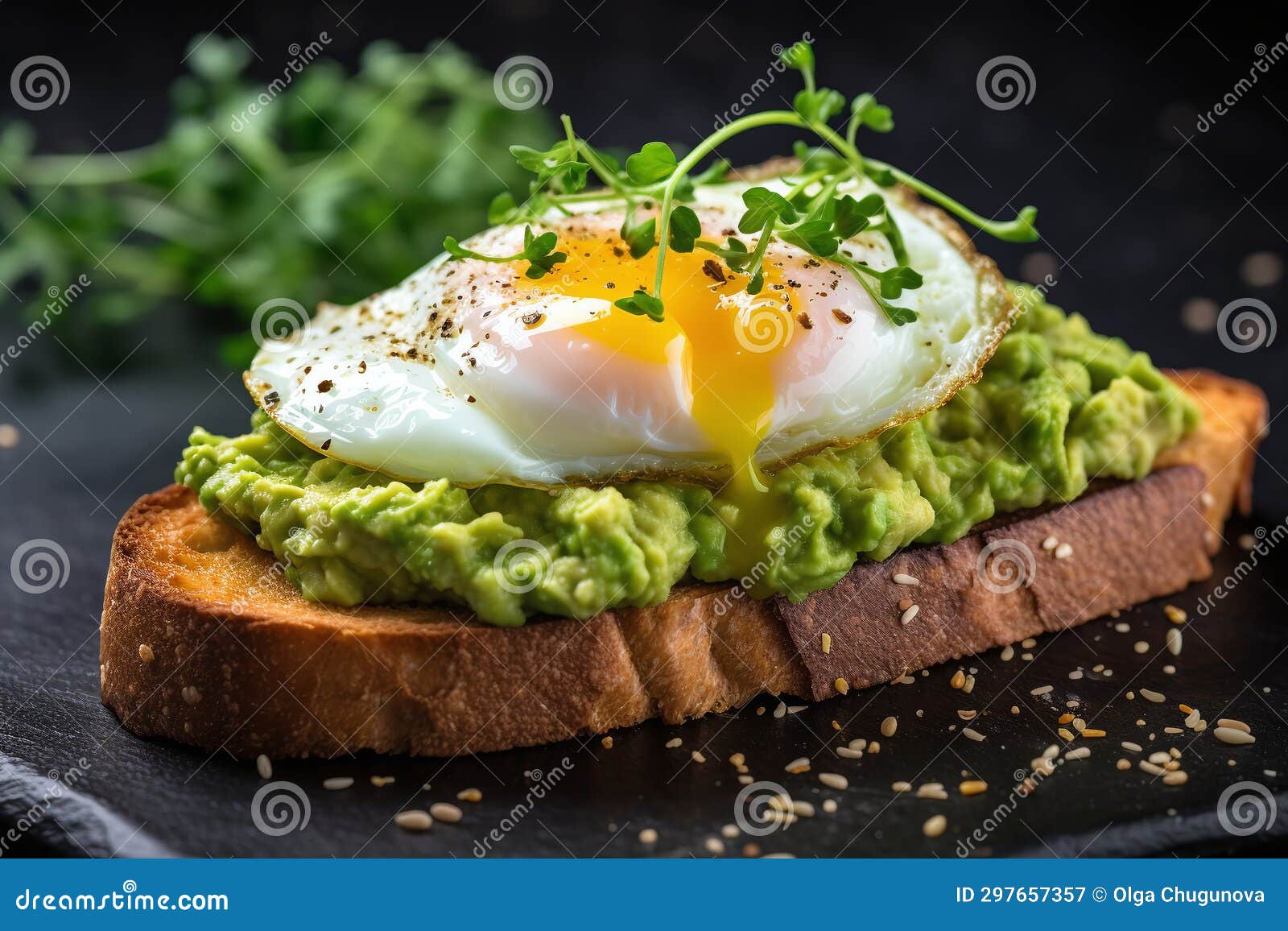 Sandwich with Avocado Egg and Whole Grain Bread on a Dark Background