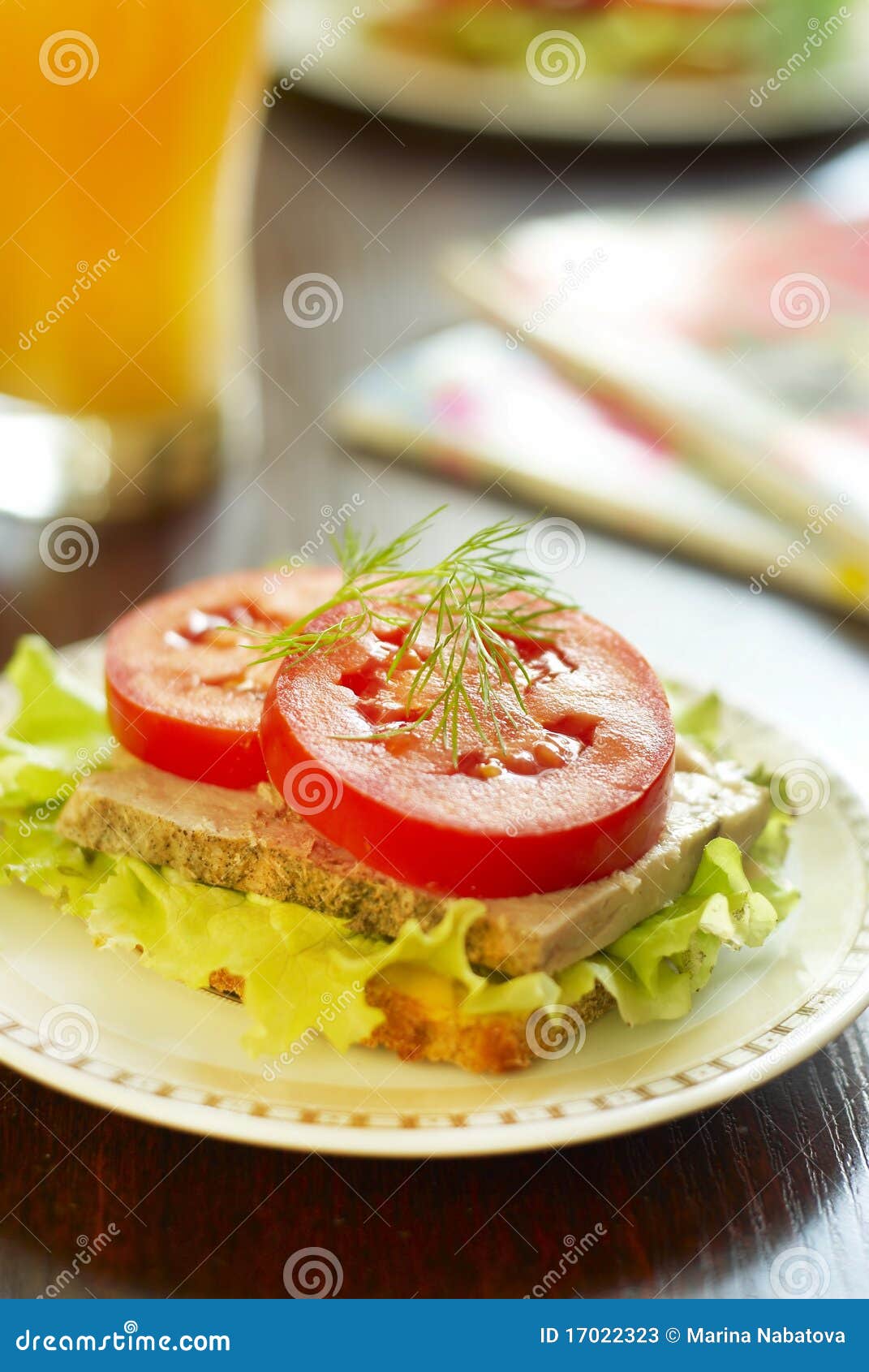 Sandwich with baked ham and vegetables. Sandwich with baked ham, lettuce and tomato