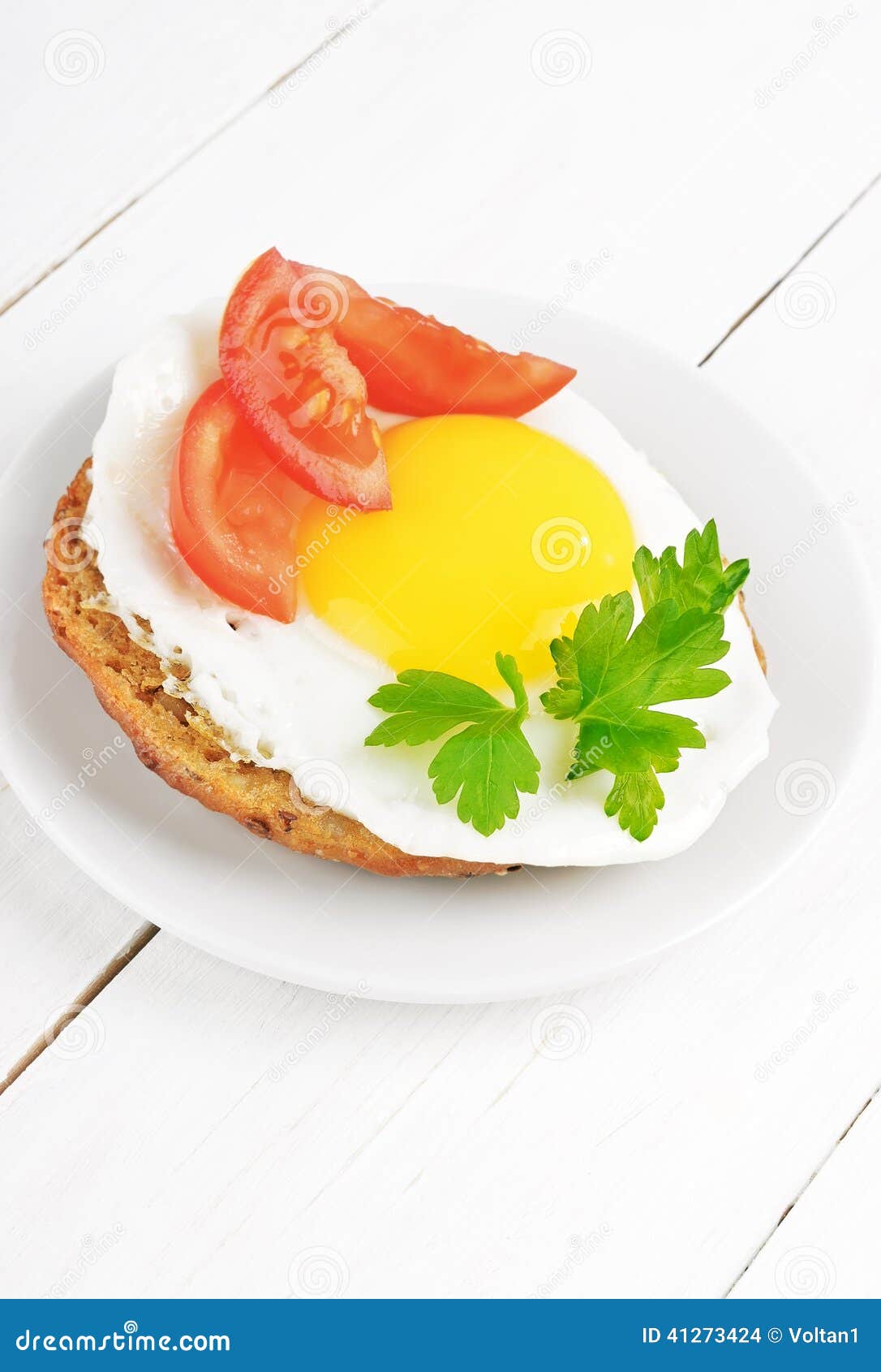 Sandwich with Fried Egg, Tomato Slices and Parsley Stock Photo Image