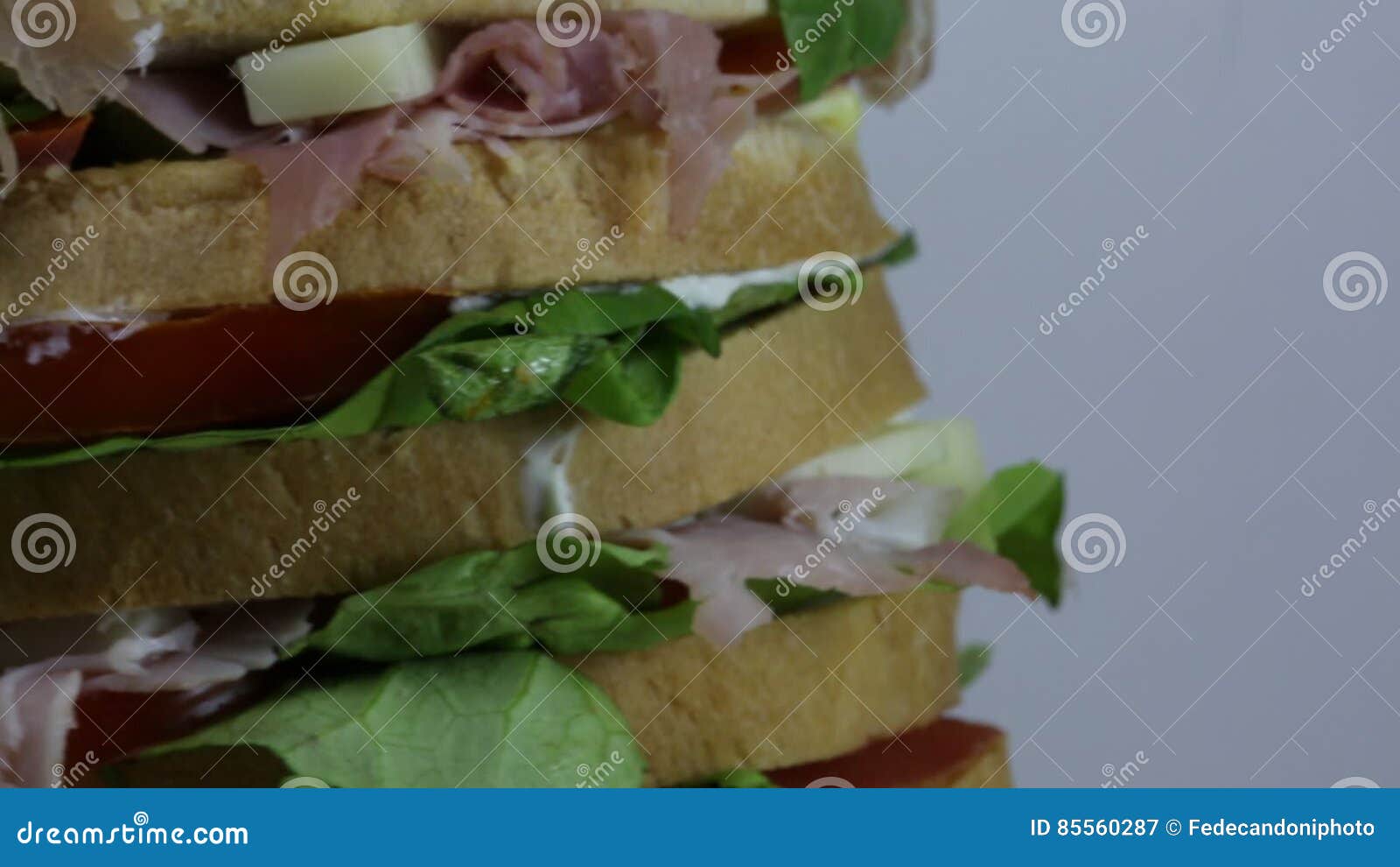 https://thumbs.dreamstime.com/z/sandwich-lettuce-tomato-cheese-salami-ham-giant-stuffed-many-layers-bread-bacon-mayonnaise-85560287.jpg