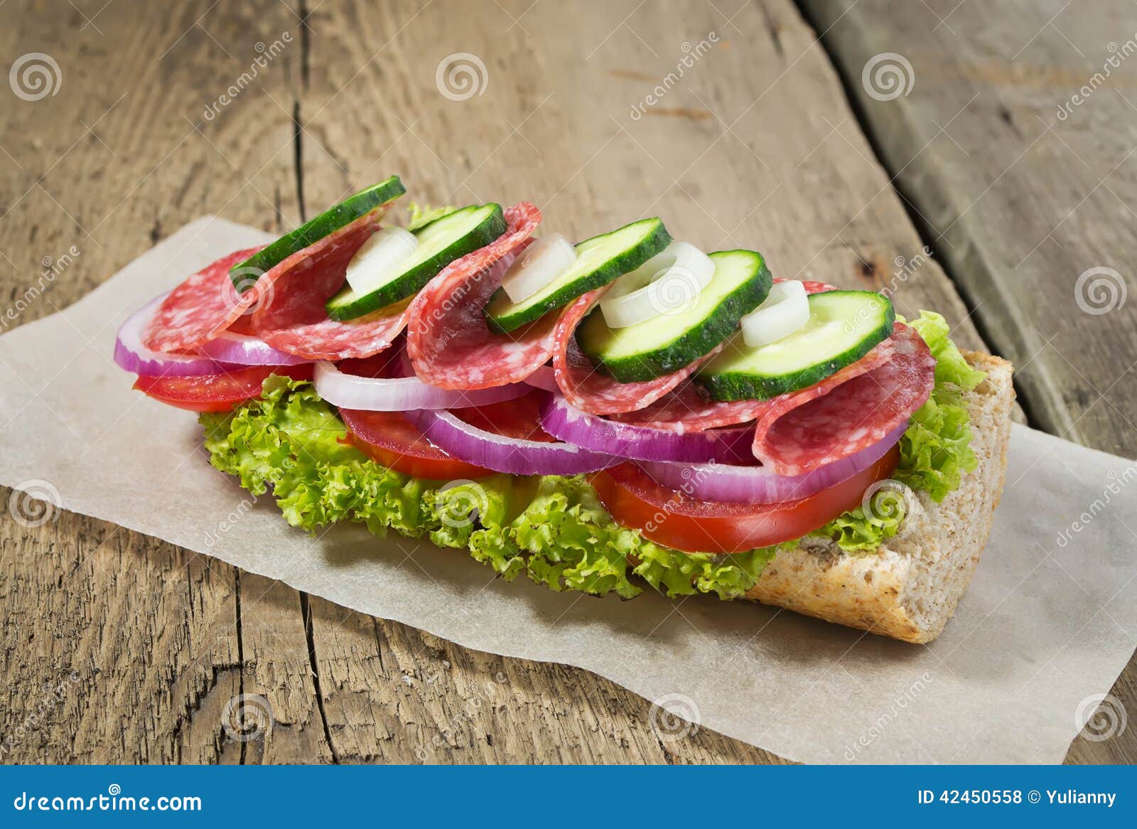 Sandwich with Salami, Tomato and Lettuce Stock Photo Image of large