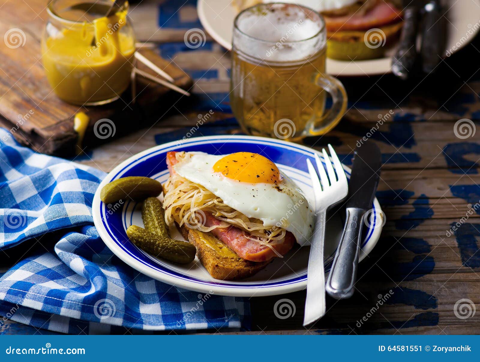 Sandwich With Sauerkraut , Ham And Fried Eggs RoyaltyFree Stock Photography