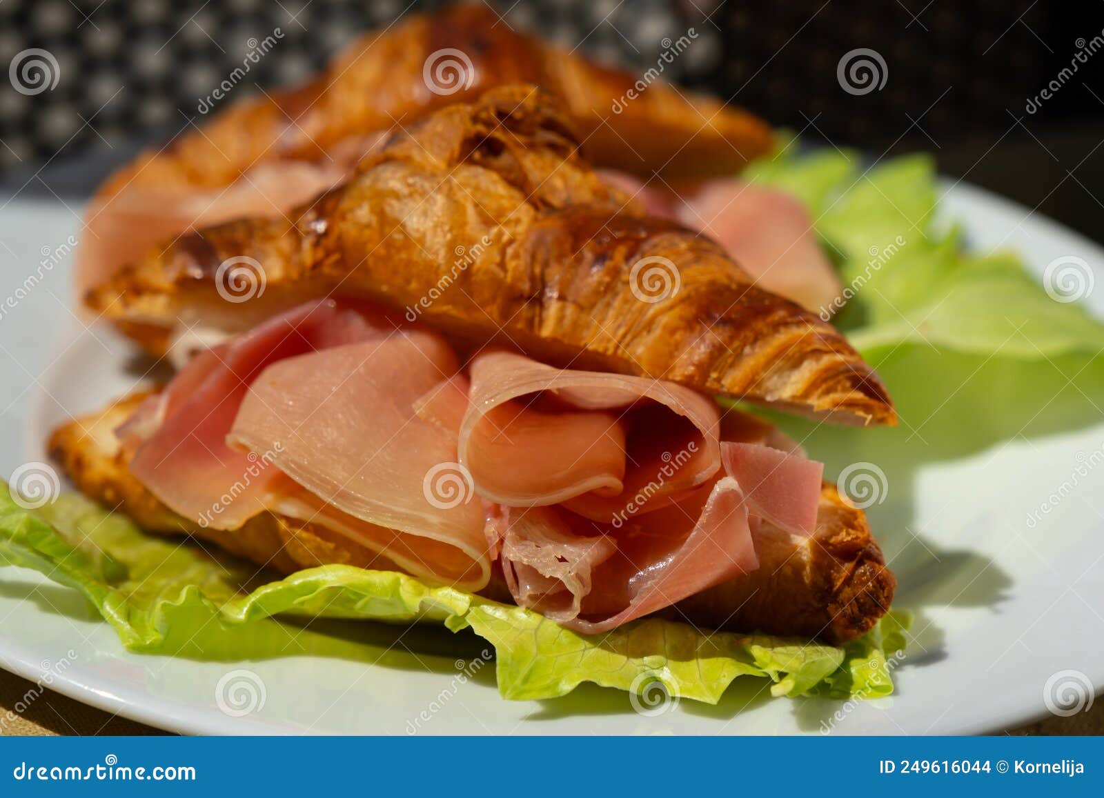 Croissant with prosciutto stock photo. Image of breakfast 249616044