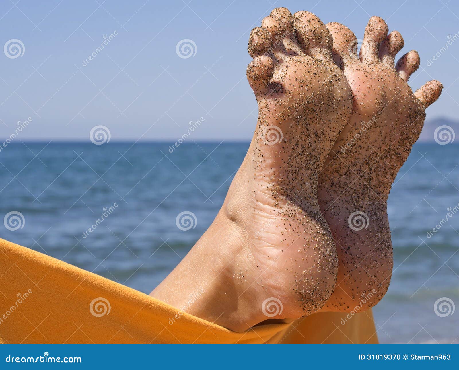 sandy crazy woman toes on the beach