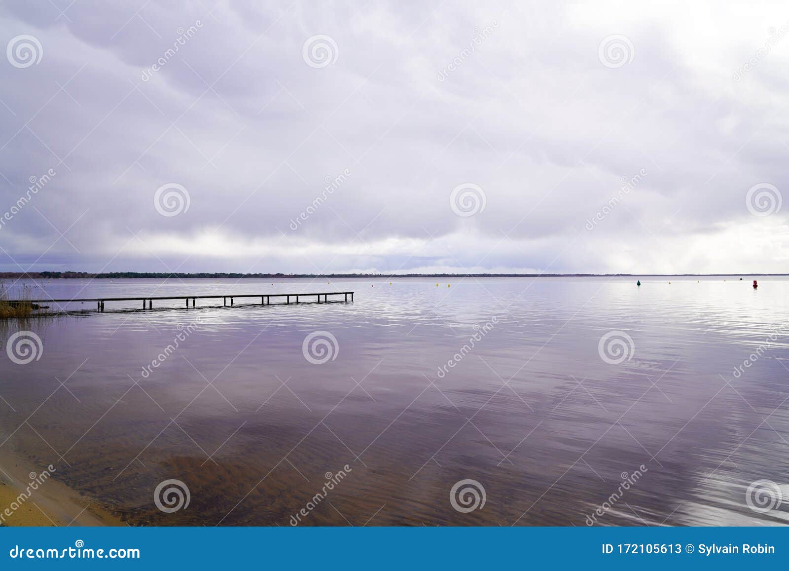 sanguinet sandy beach water image mirror reflection in biscarrosse landes france