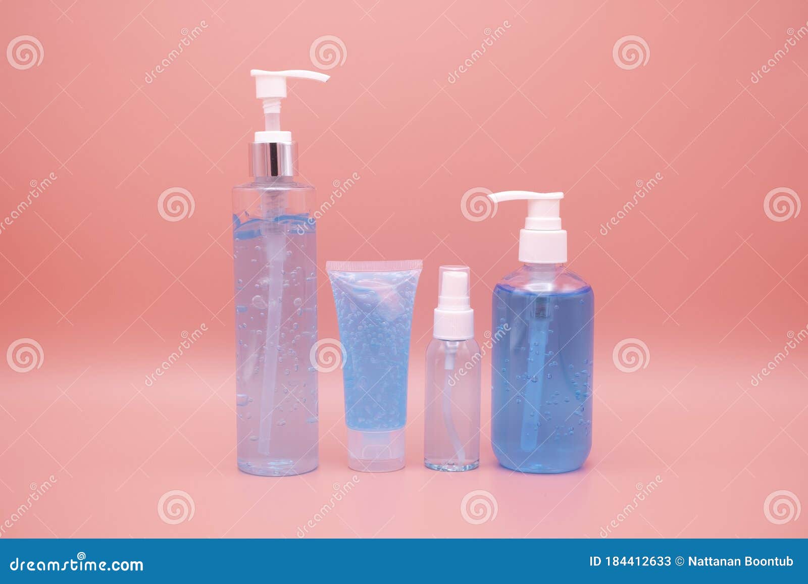 sanitizer gel pump dispenser. clear sanitizer in pump bottle, for killing germs, bacteria and virus. isolate on pink background
