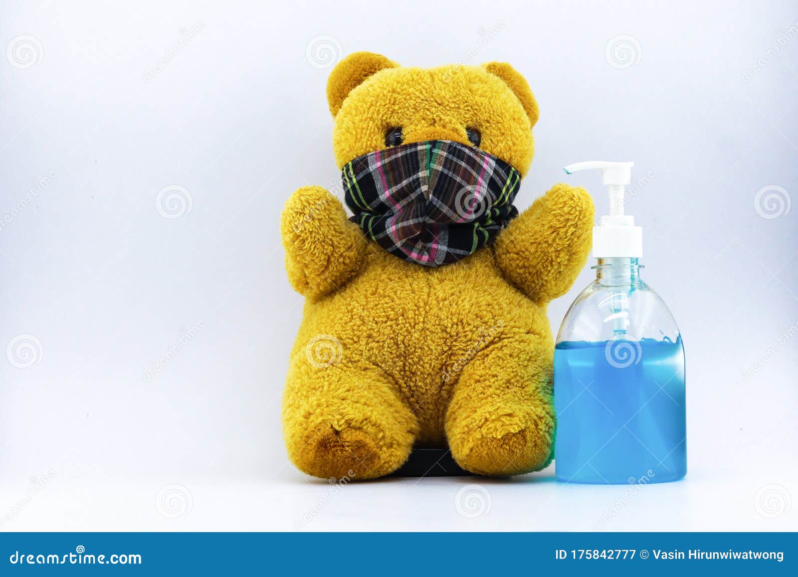 Sanitizing Hand Gel And Teddy Bear Wearing Face Mask Stock Image