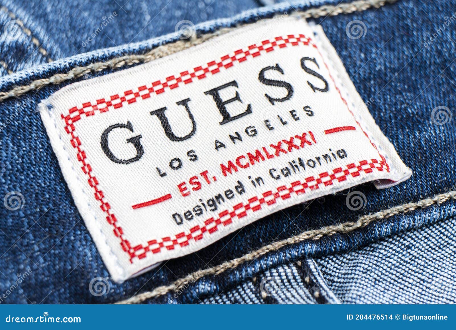 Close-up of the Guess Jeans Logo. Macro Shot Guess Logo on Jeans Editorial Stock Image - Image of denim: 204476514