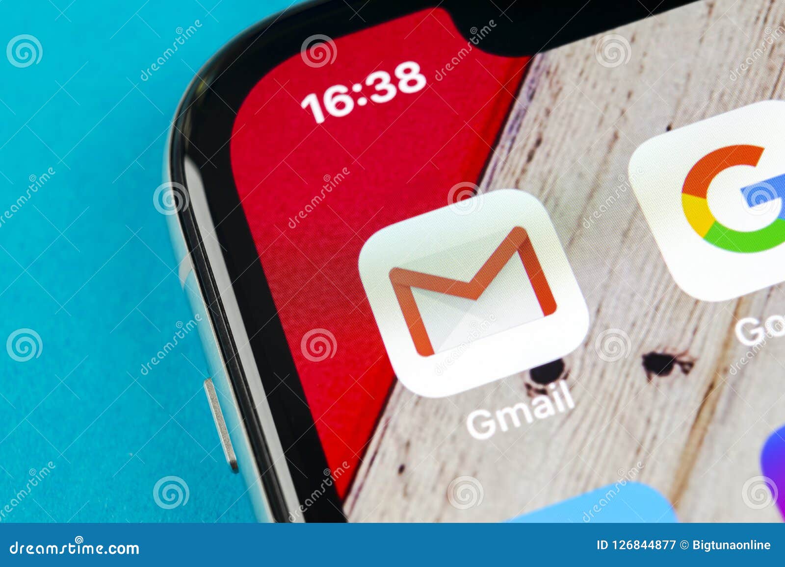 Sankt-Petersburg, Russia, September 19, 2018: Google Gmail application icon on Apple iPhone X smartphone screen close-up. Gmail app icon. Gmail is popular Internet online e-mail. Social media icon