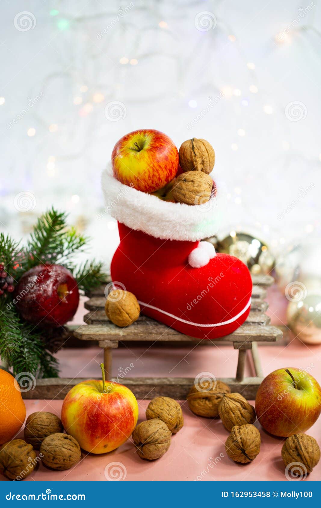 Santa Boots Filled with Nuts and Apples, Decoration Stock Photo - Image ...