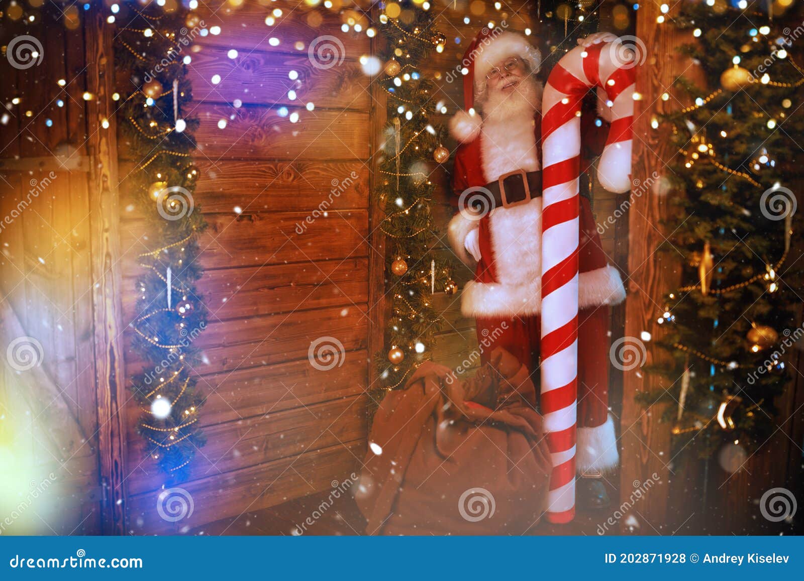 Santa with candy cane stock photo. Image of kind, house - 202871928