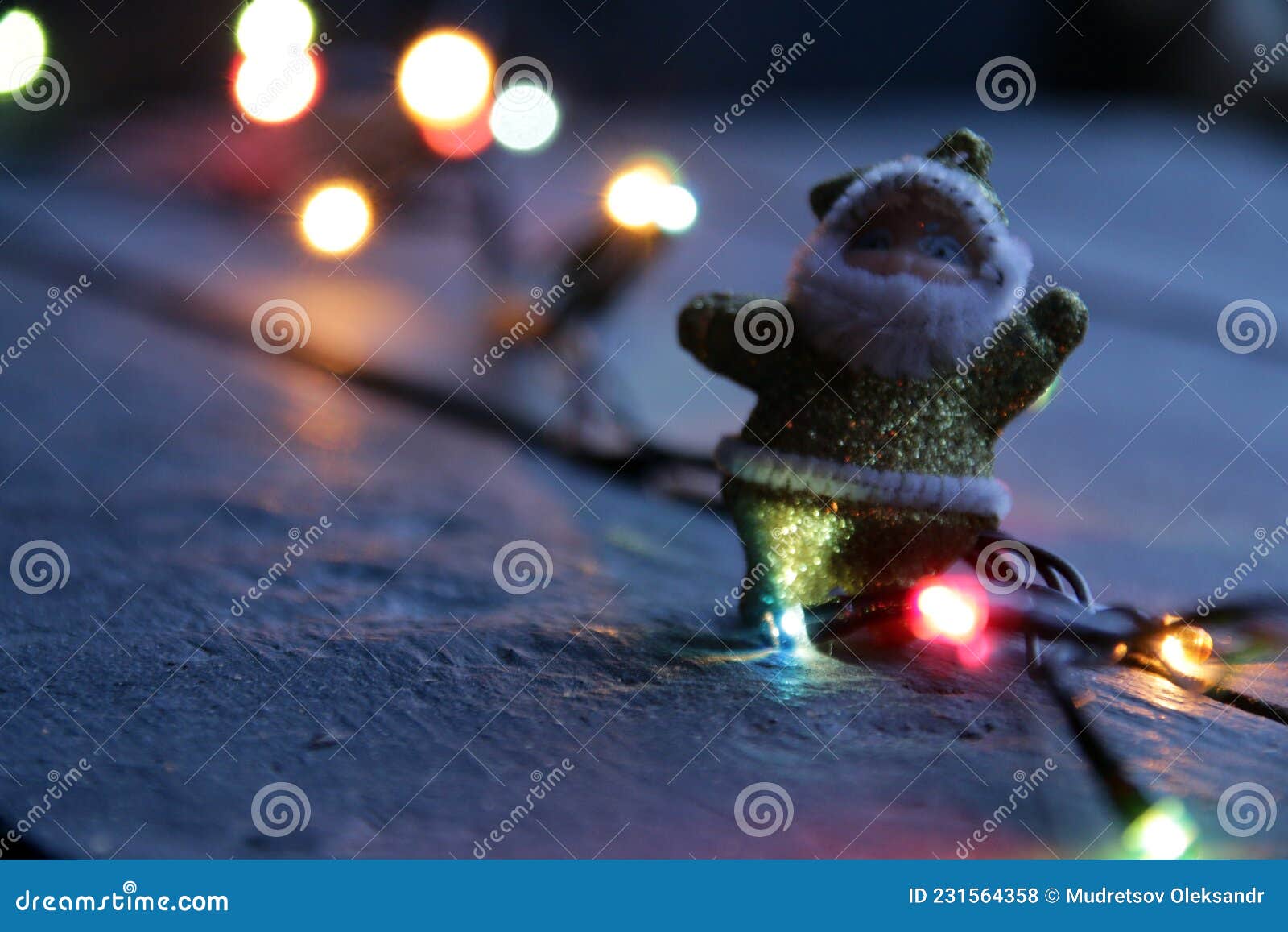 Santa Claus on the Background of Christmas Lights Stock Photo Image