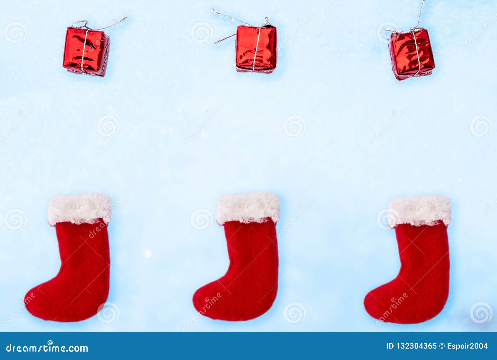 Santa Claus Boots and Gift Boxes in the Form of a Frame on a White ...