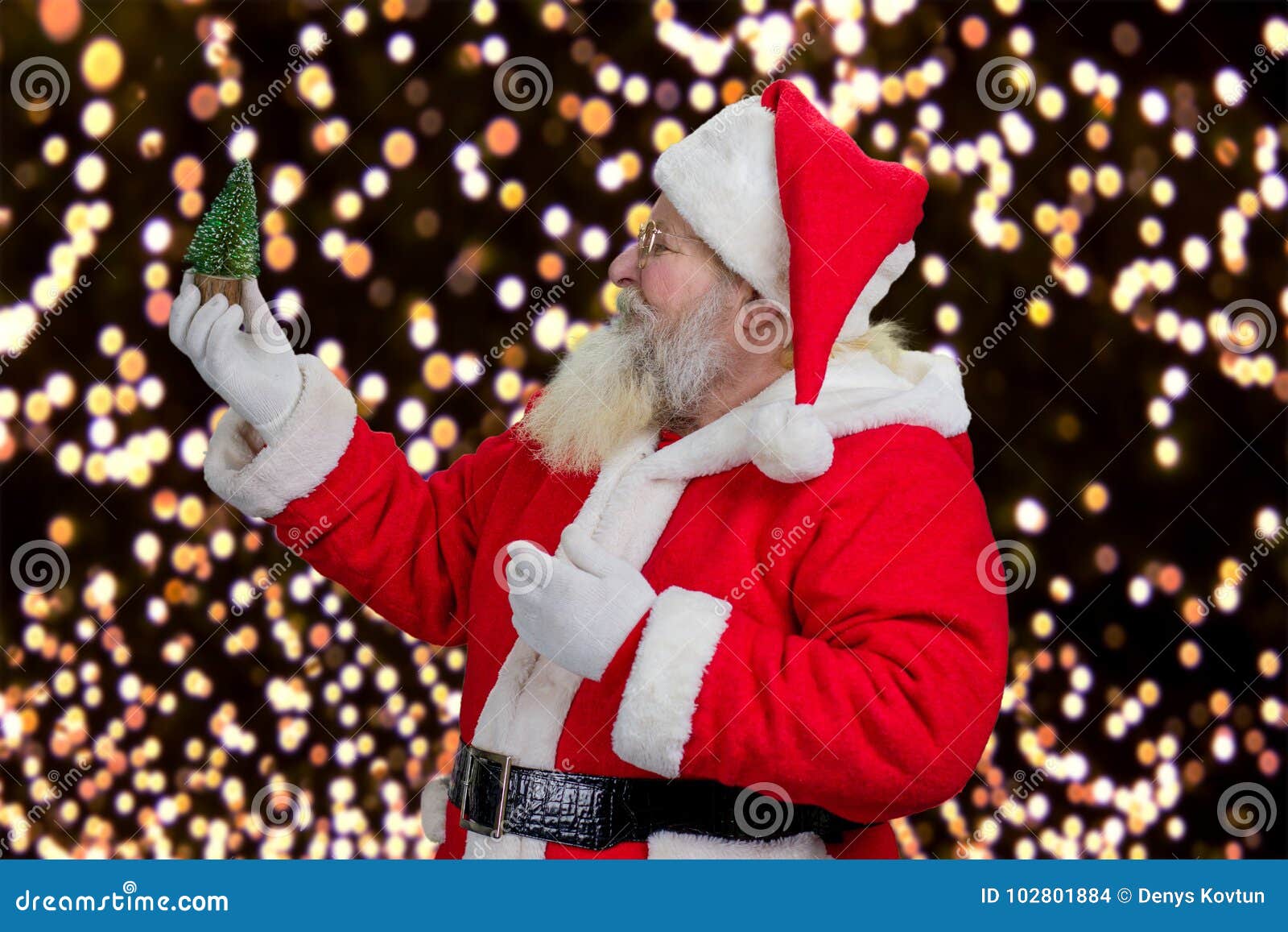 Christmas Ornament Santa Claus Holding Small Tree