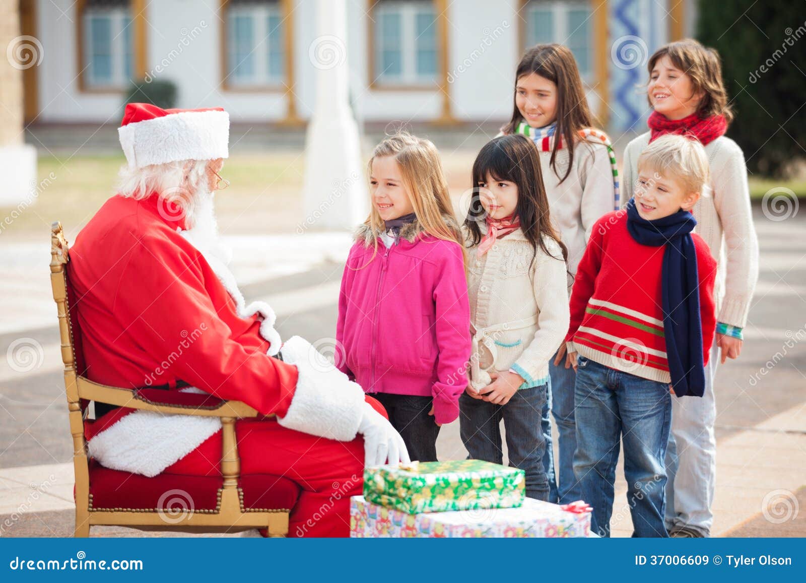 Santa Claus Looking At Children Standing In A Royalty Free Stock Images Image 37006609