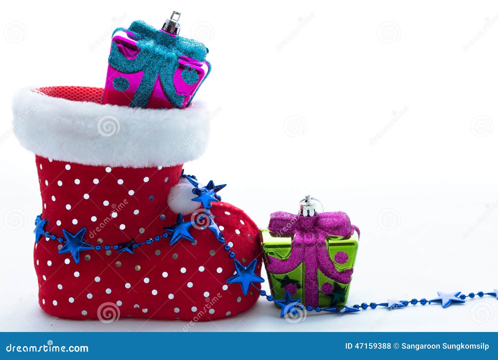 Santa claus shoe and gift stock photo. Image of christmas - 47159388