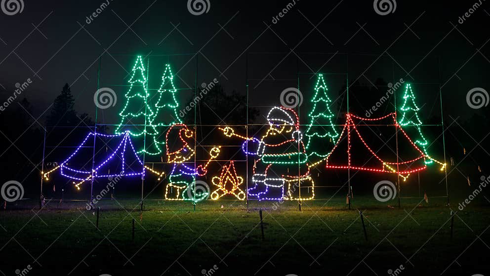 Santa Family Roasting Marshmallow by Campfire Stock Photo Image of