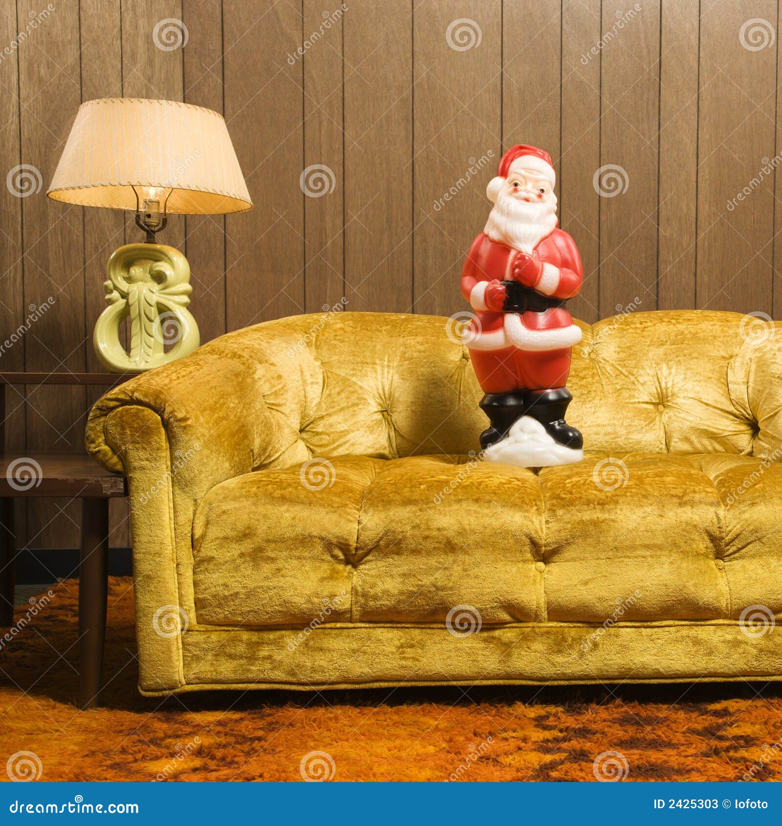 santa figurine on couch.