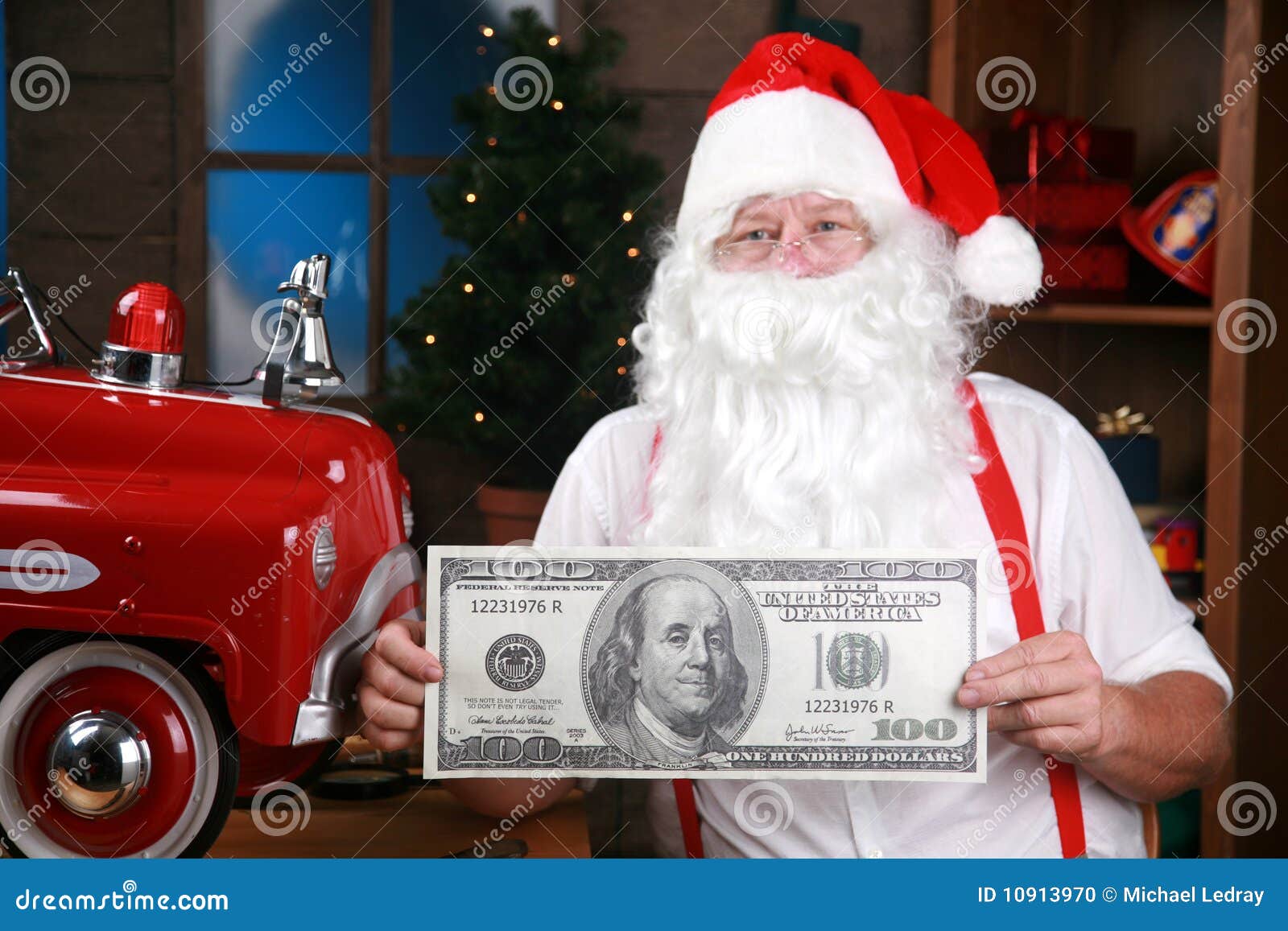 Santa Holds A Giant One Hundred Dollar Bill Stock Photo Image 10913970