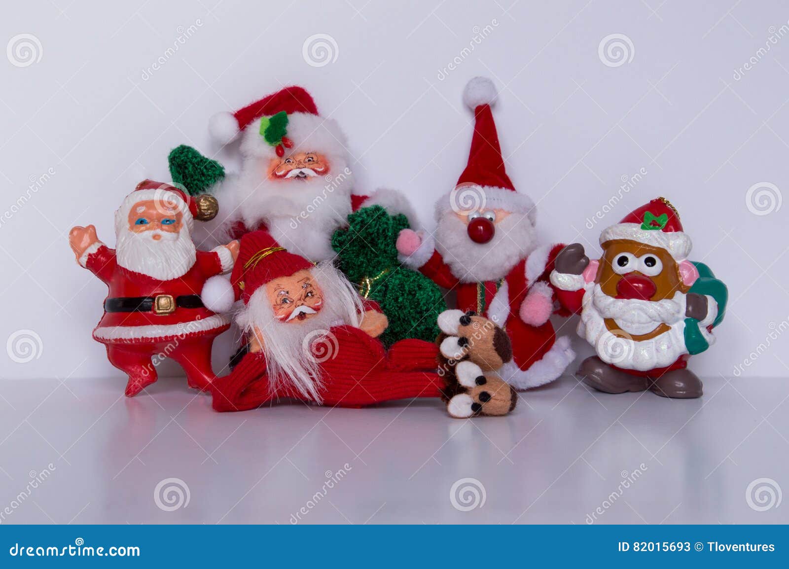 Santa Lying on His Side with Mr. Potato Head Santa on Right Stock Image ...
