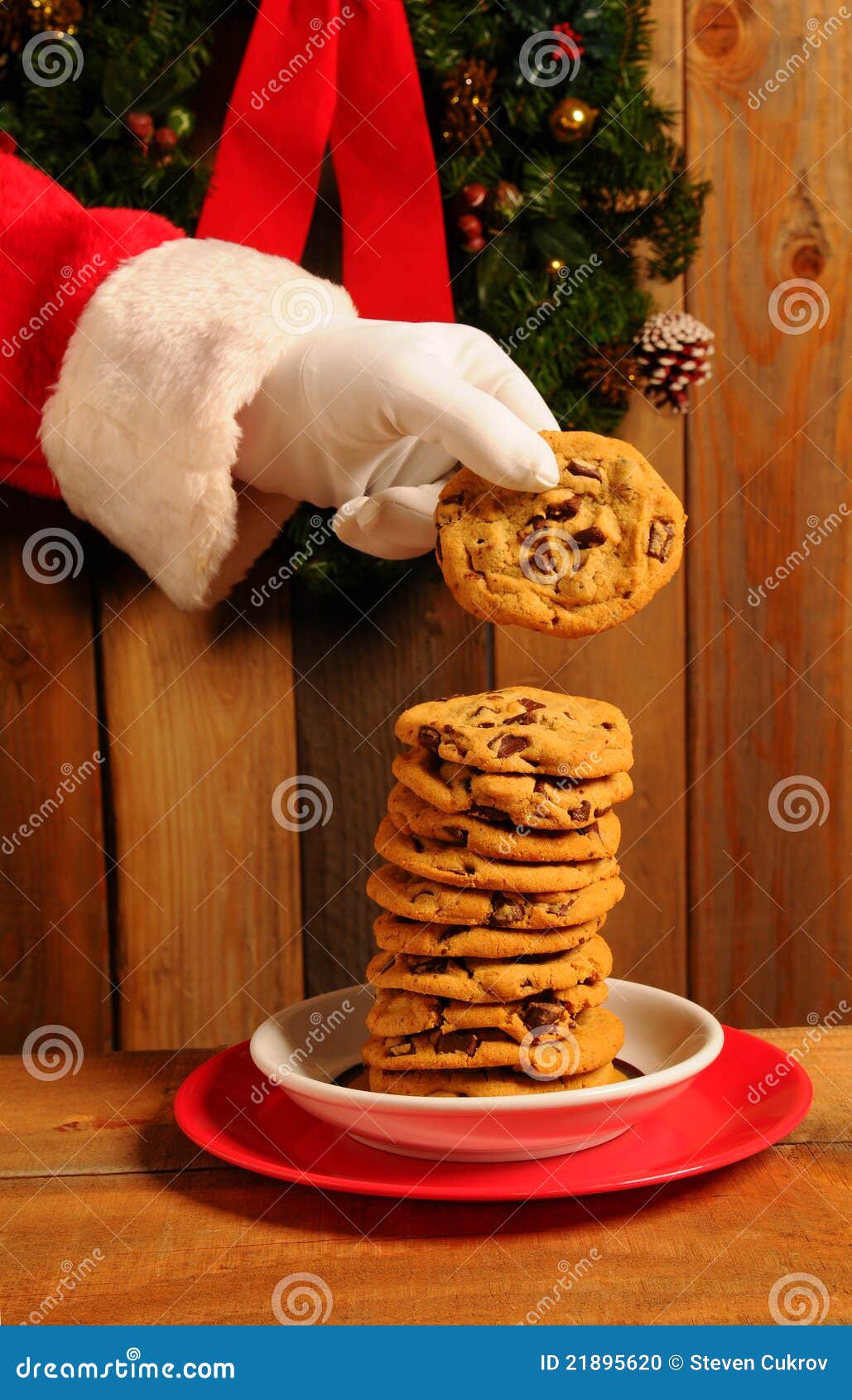 Santa Taking Cookie from Stack on Plate Stock Photo Image of santa