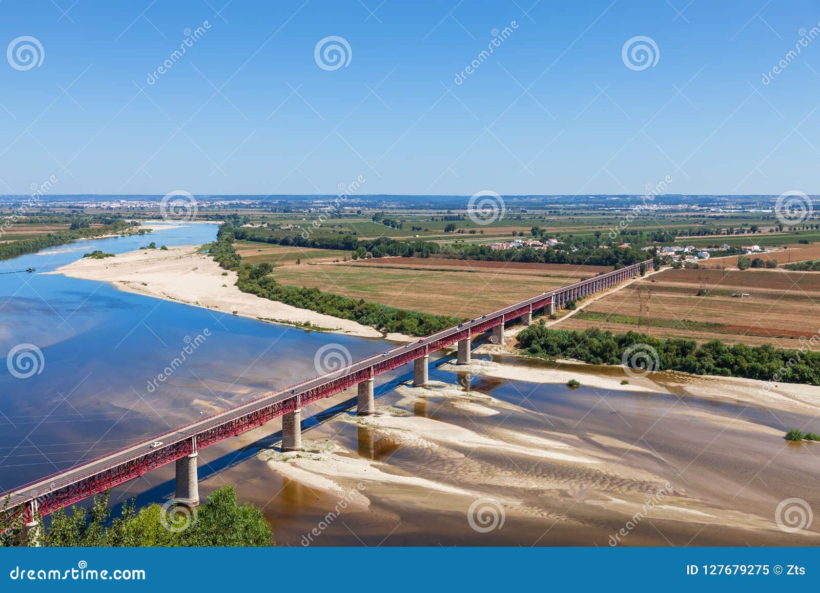 santarem, portugal. ponte dom luis i bridge, tagus river and leziria fields