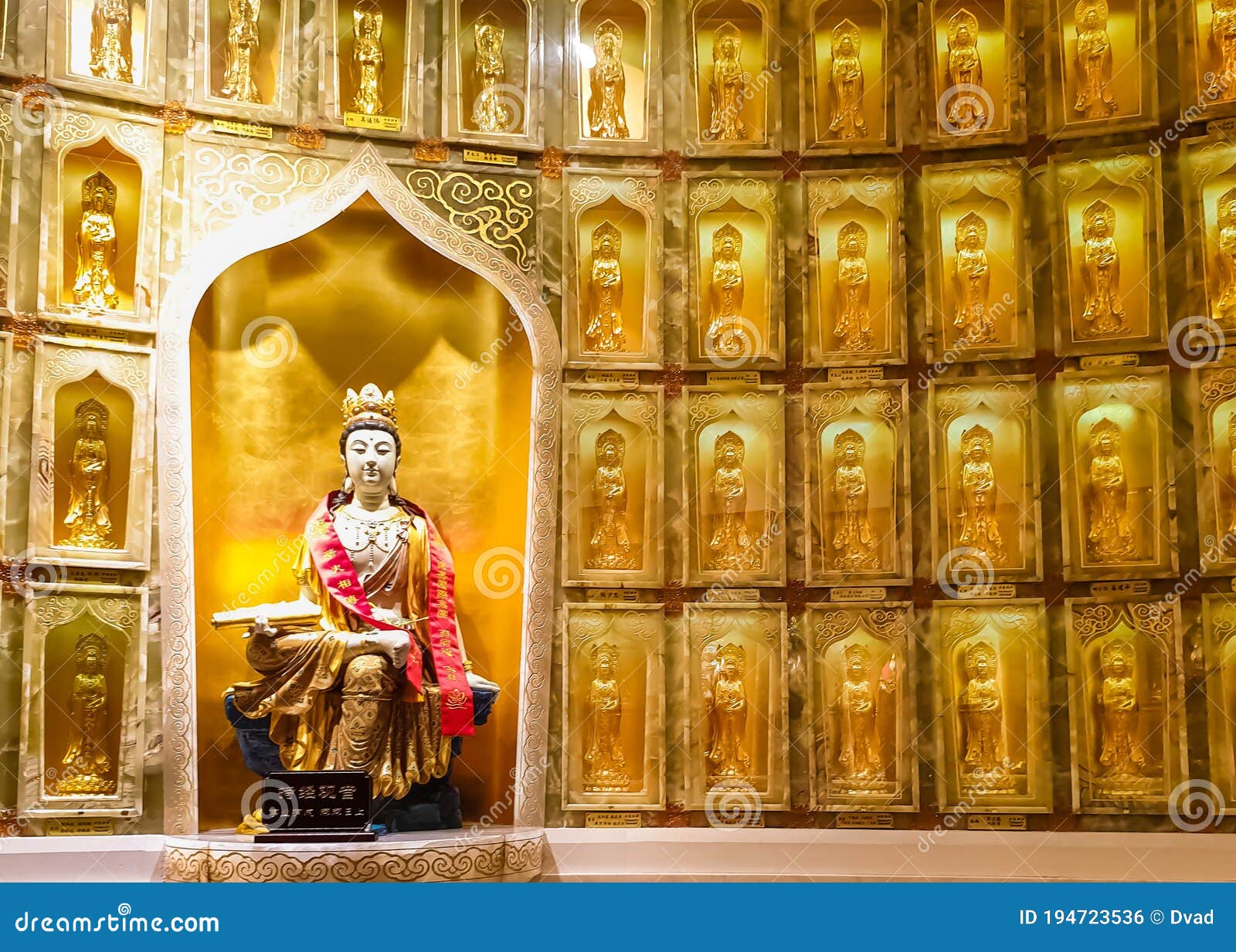 goddess guanin gold statue in the guanin temple in the buddhist center nanshan