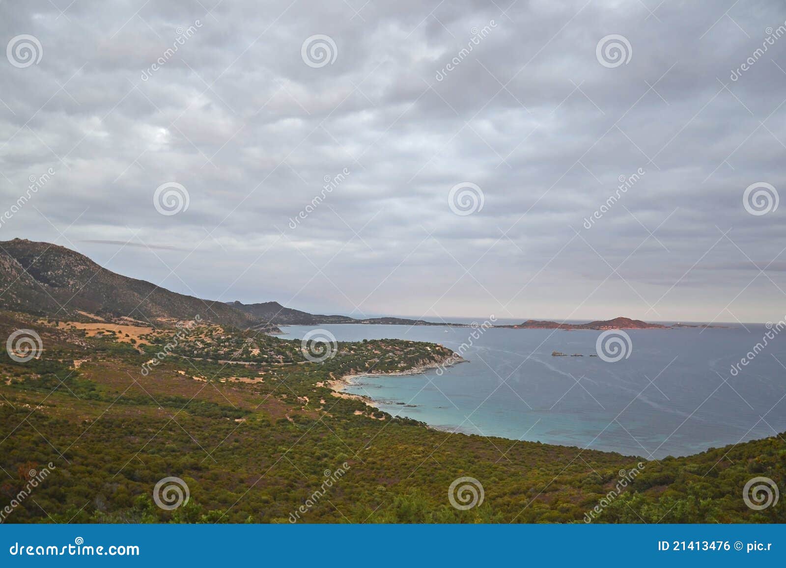 Sardinia coastline and Villasimius - Italy. Long view from the Cagliari region to Villasimius promontory at dusk