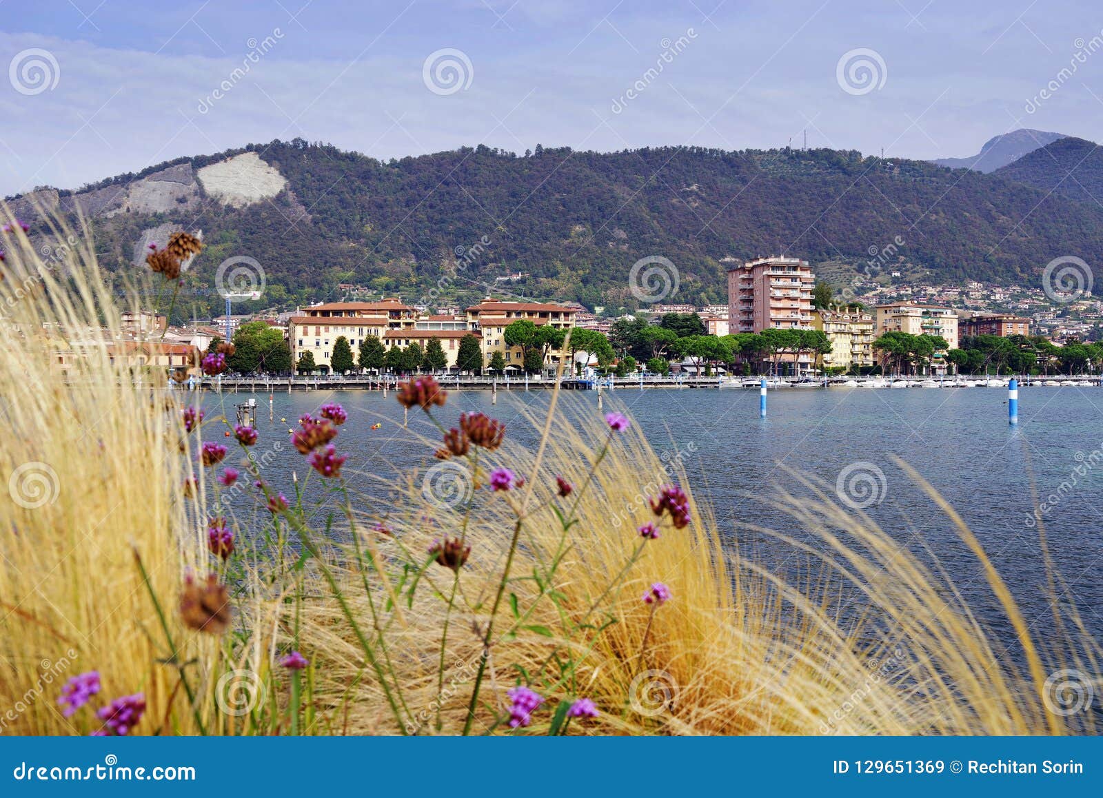 sarnico town seen from paratico, the town from the opposite shore of lake iseo.