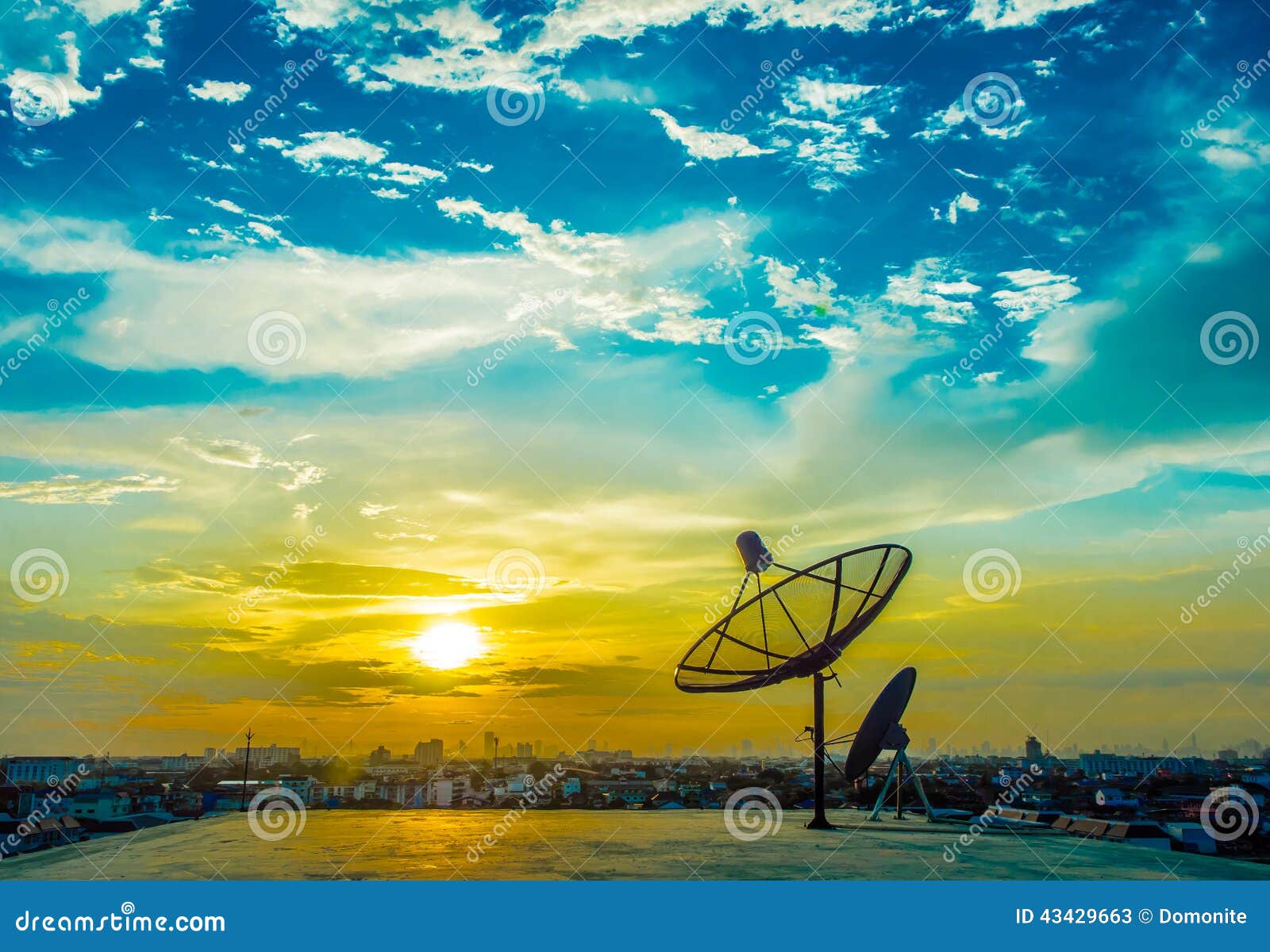 satelite dishes with sunset