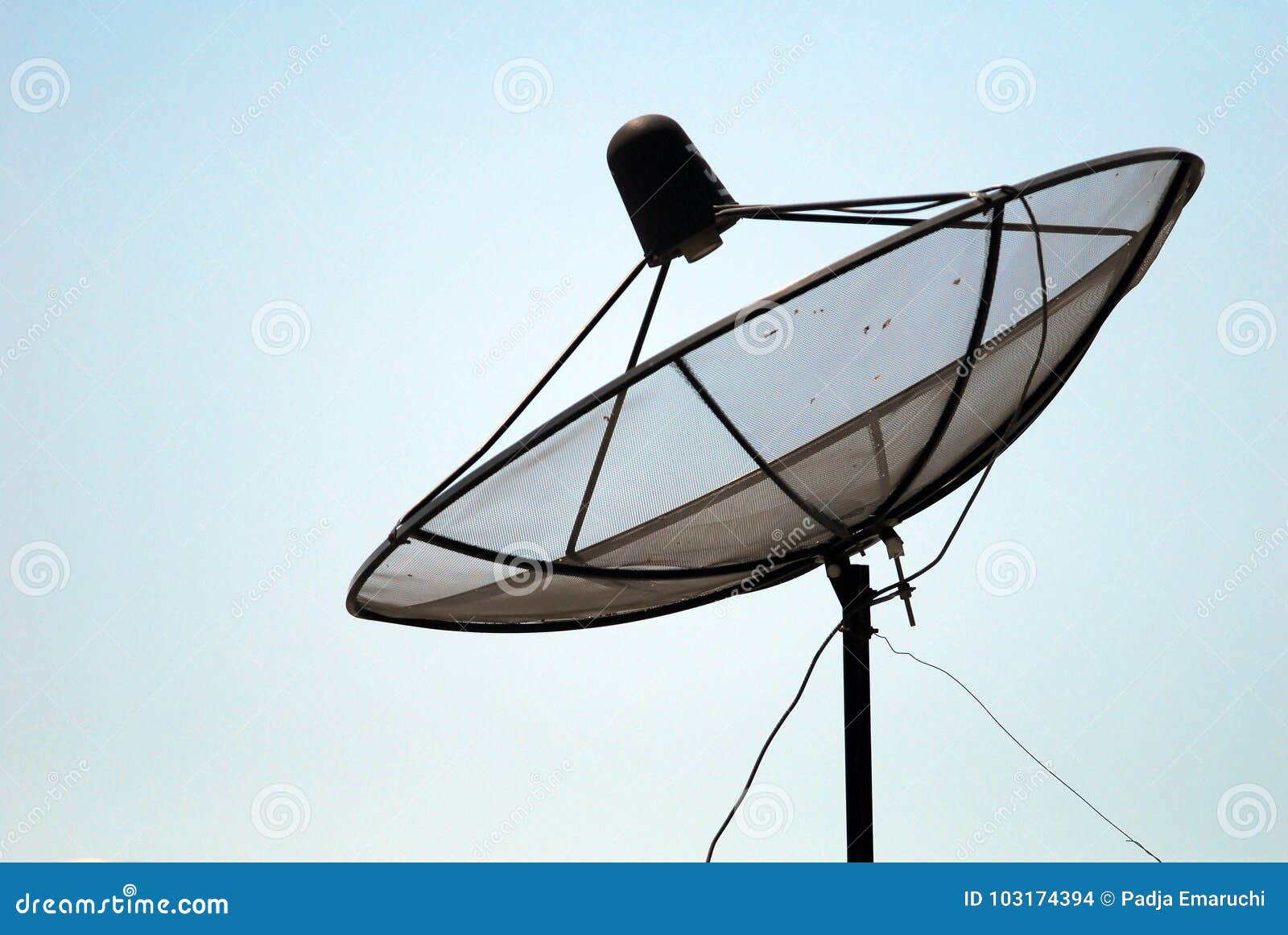 A Satellite Dish with Blue Sky and Black Pole Stock Photo Image of