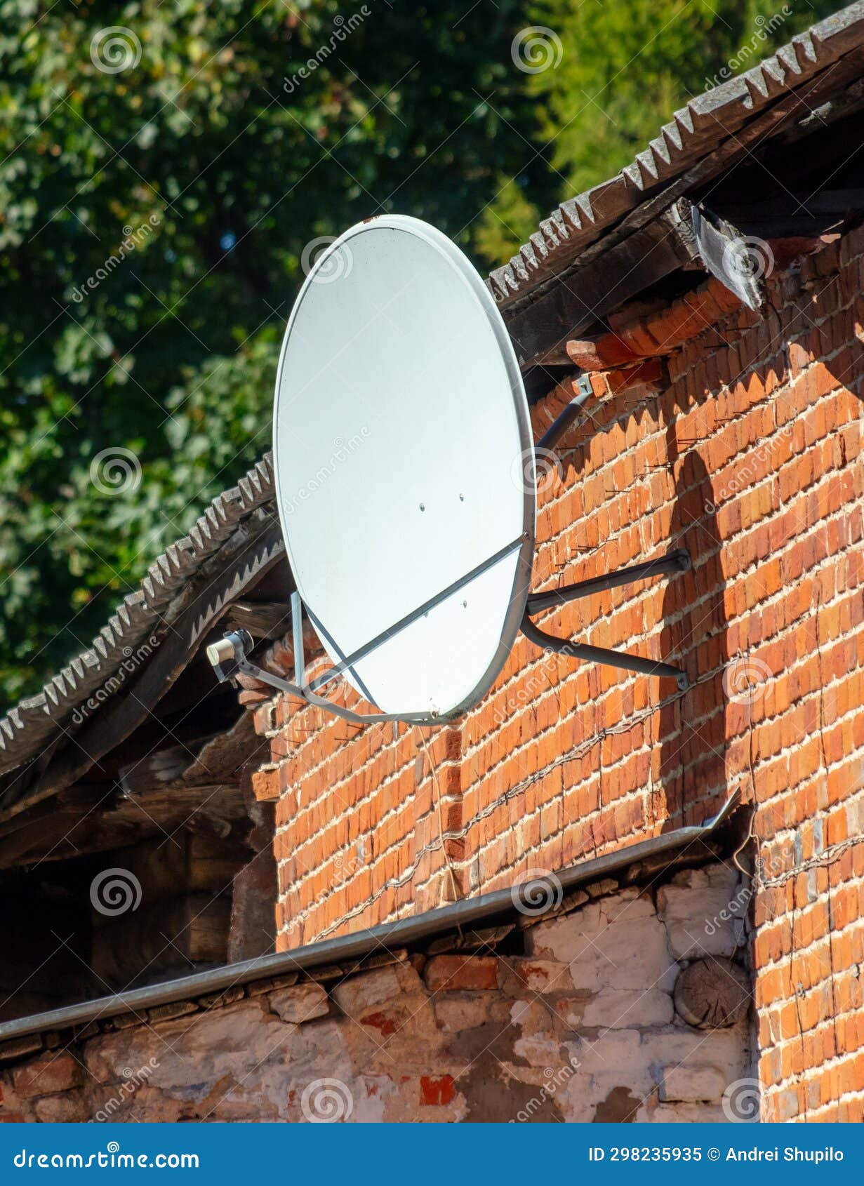 Satellite Dish on the Wall of a Brick House Stock Image Image of