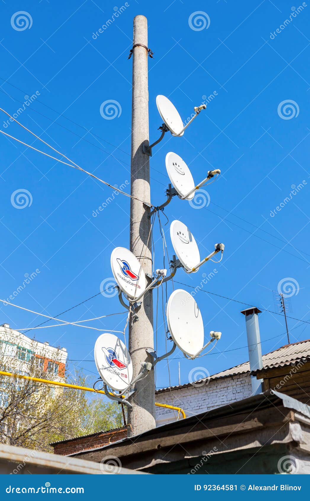 Satellite Dishes Mounted on a Pole Against the Blue Sky Editorial Photo Image of antenna