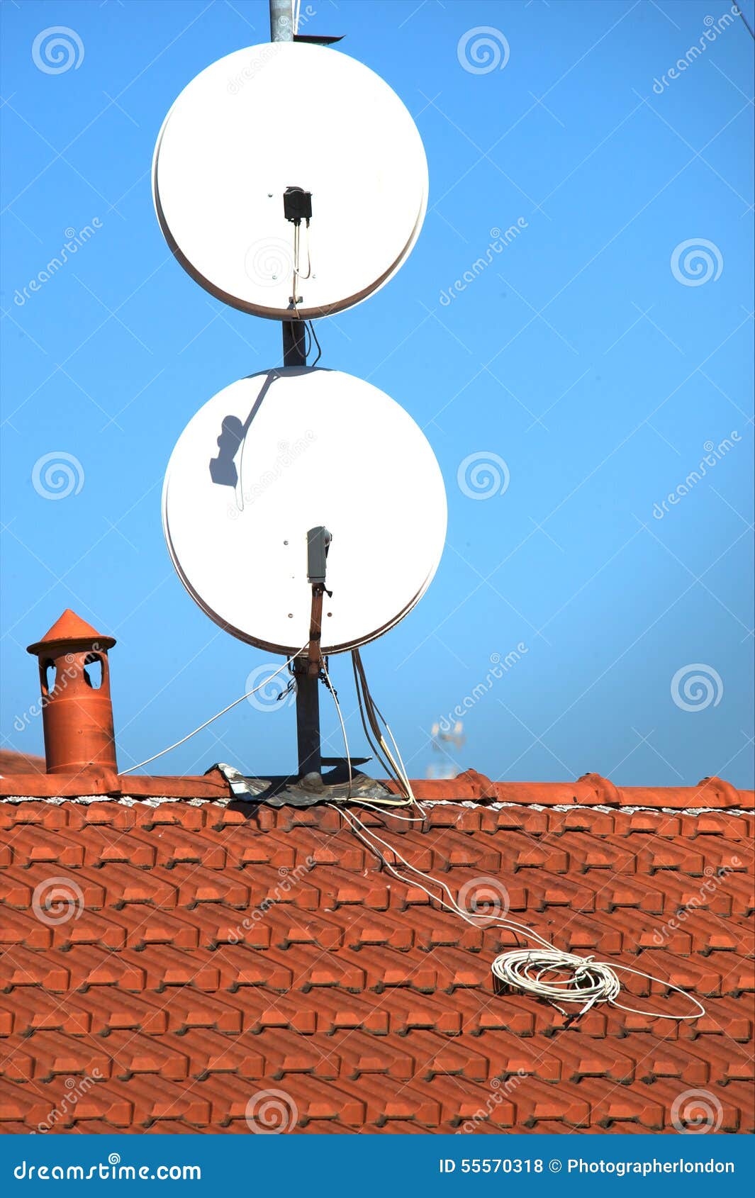 Satellite Dishes on a Tiled Roof Stock Photo Image of house, tech