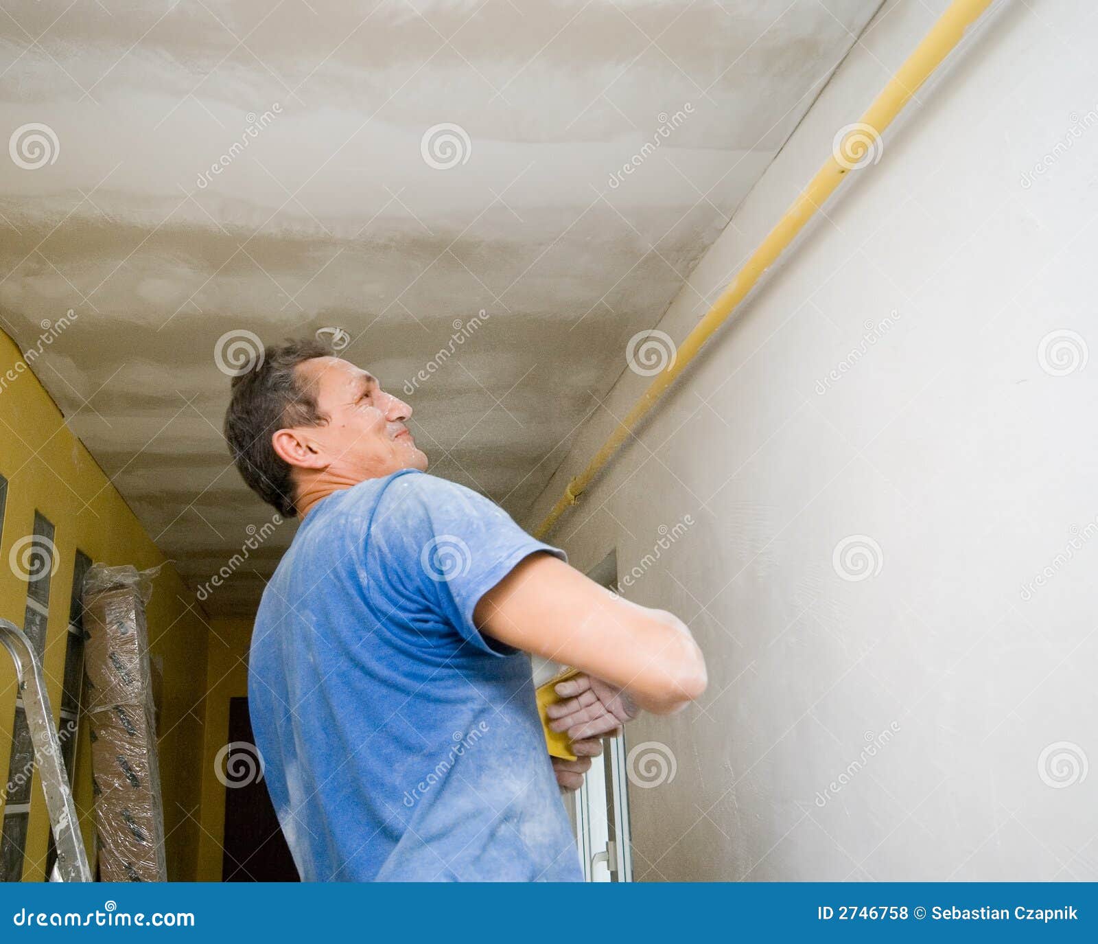 Satisfied drywaller. stock photo. Image of looking, interior 2746758
