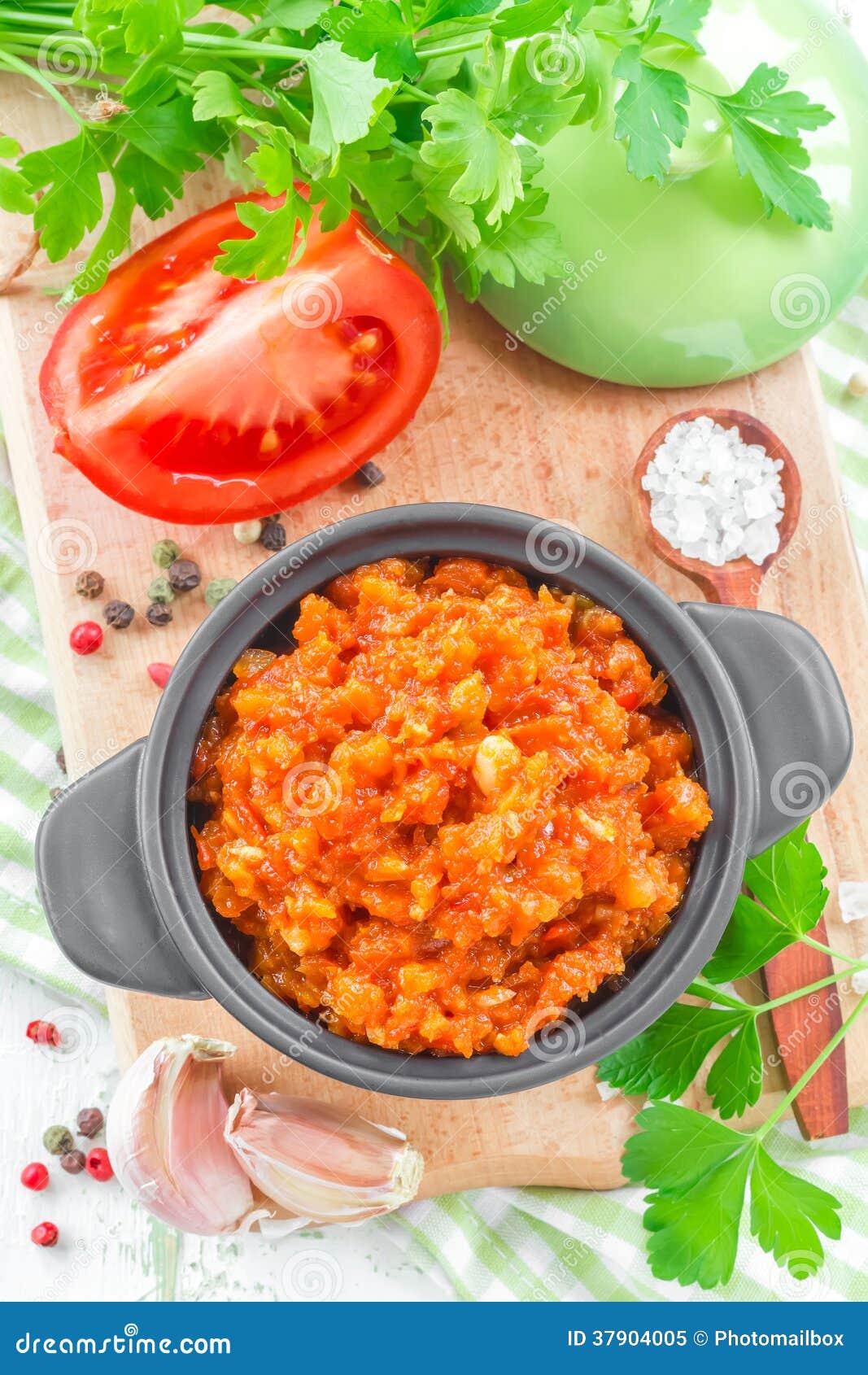 Sauce salsa in a bowl on a wooden table