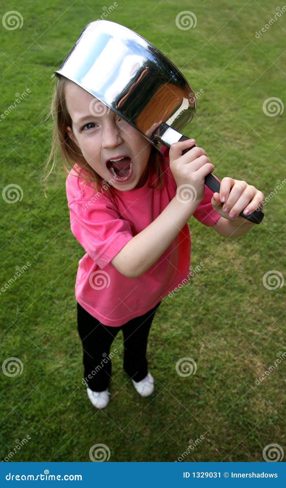 Saucepan on head stock image. Image of young, grass, looking 1329031