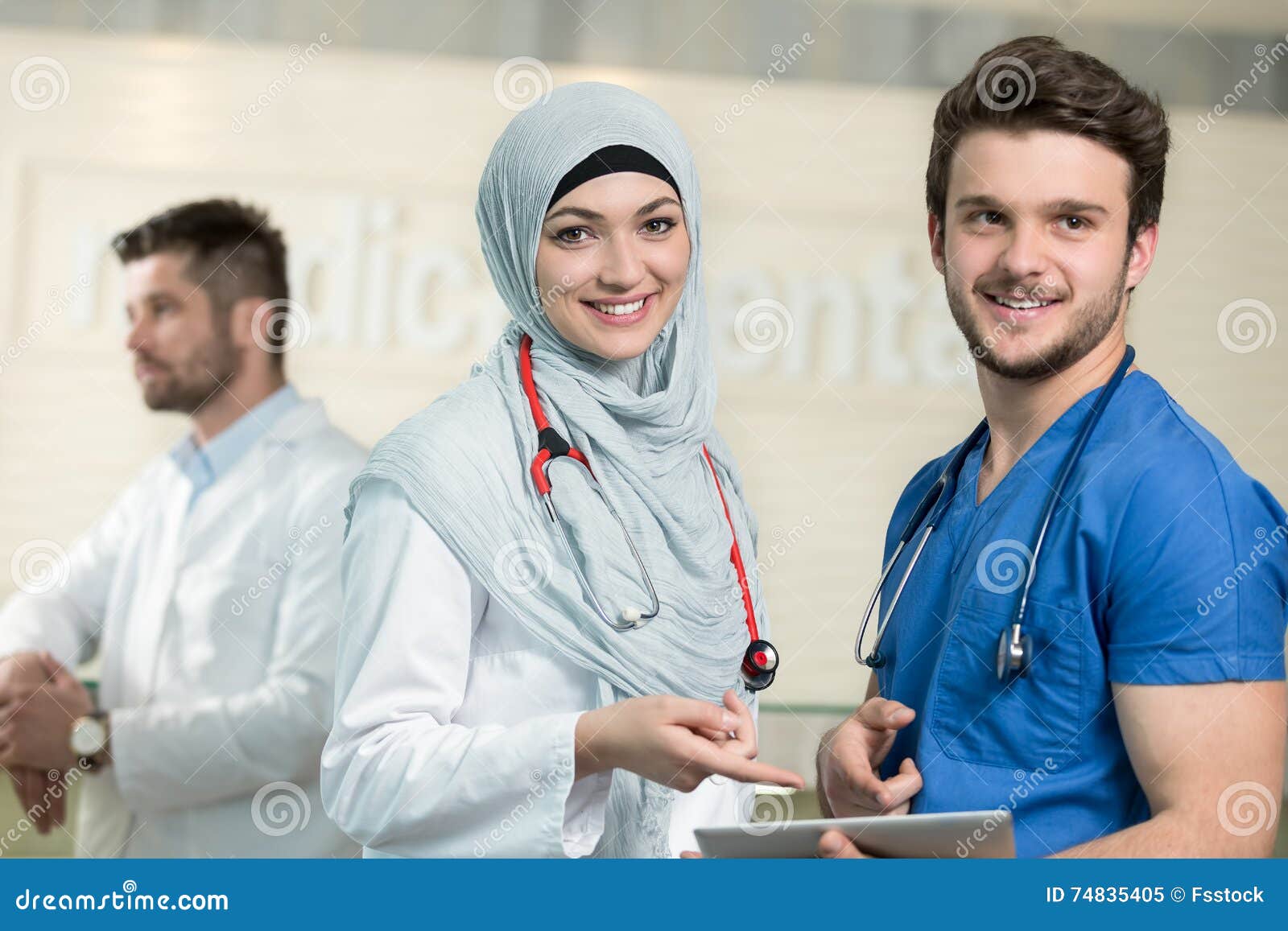 Saudi Arab Doctors Working with a Tablet. Stock Image Image of arabic