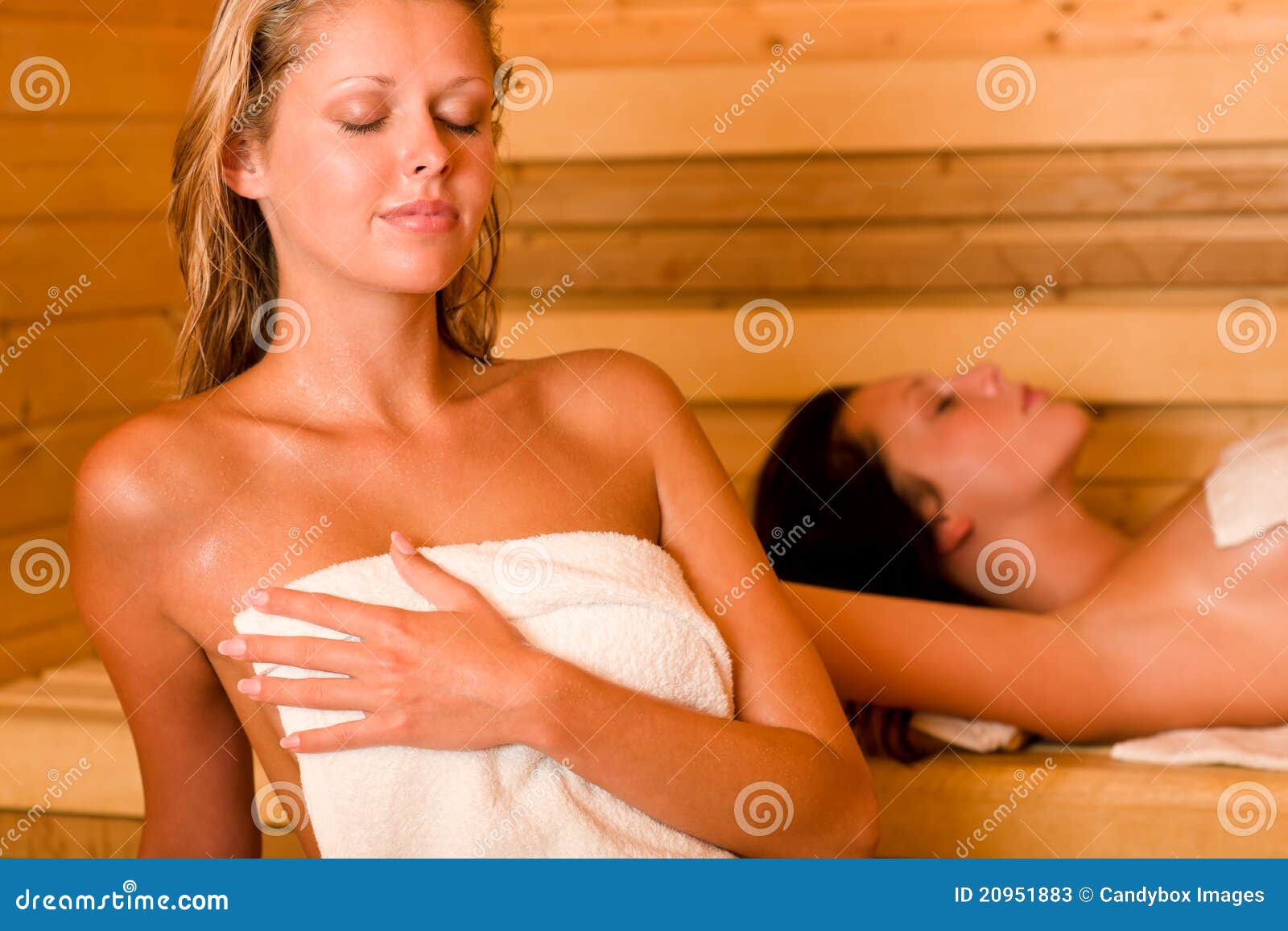 Two women at sauna wrapped in towel Stock Photo by ©CandyBoxImages