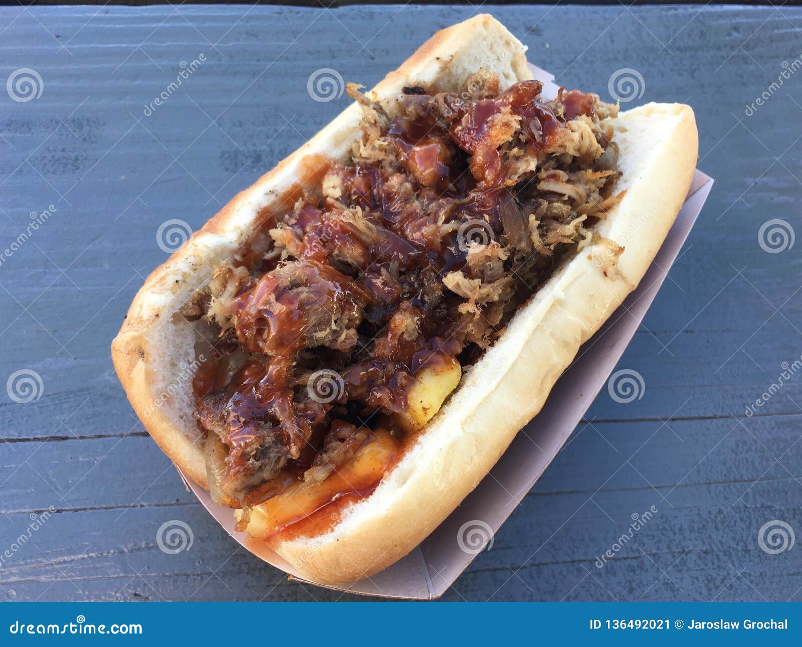Sausage Dog with Pulled Pork, Pineapple and Red Sauce Stock Image