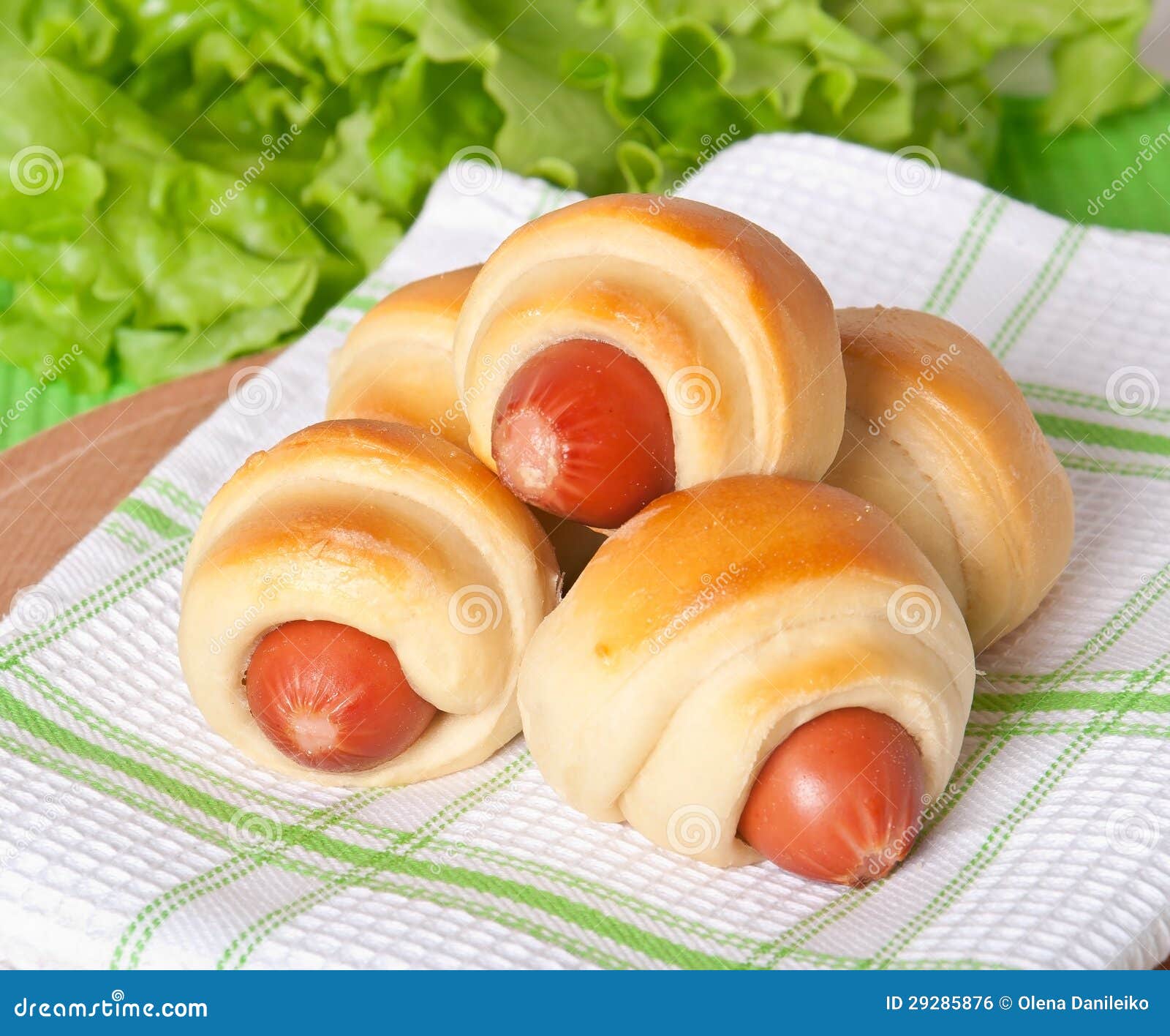 Sausage in the dough stock photo. Image of meal, green 29285876