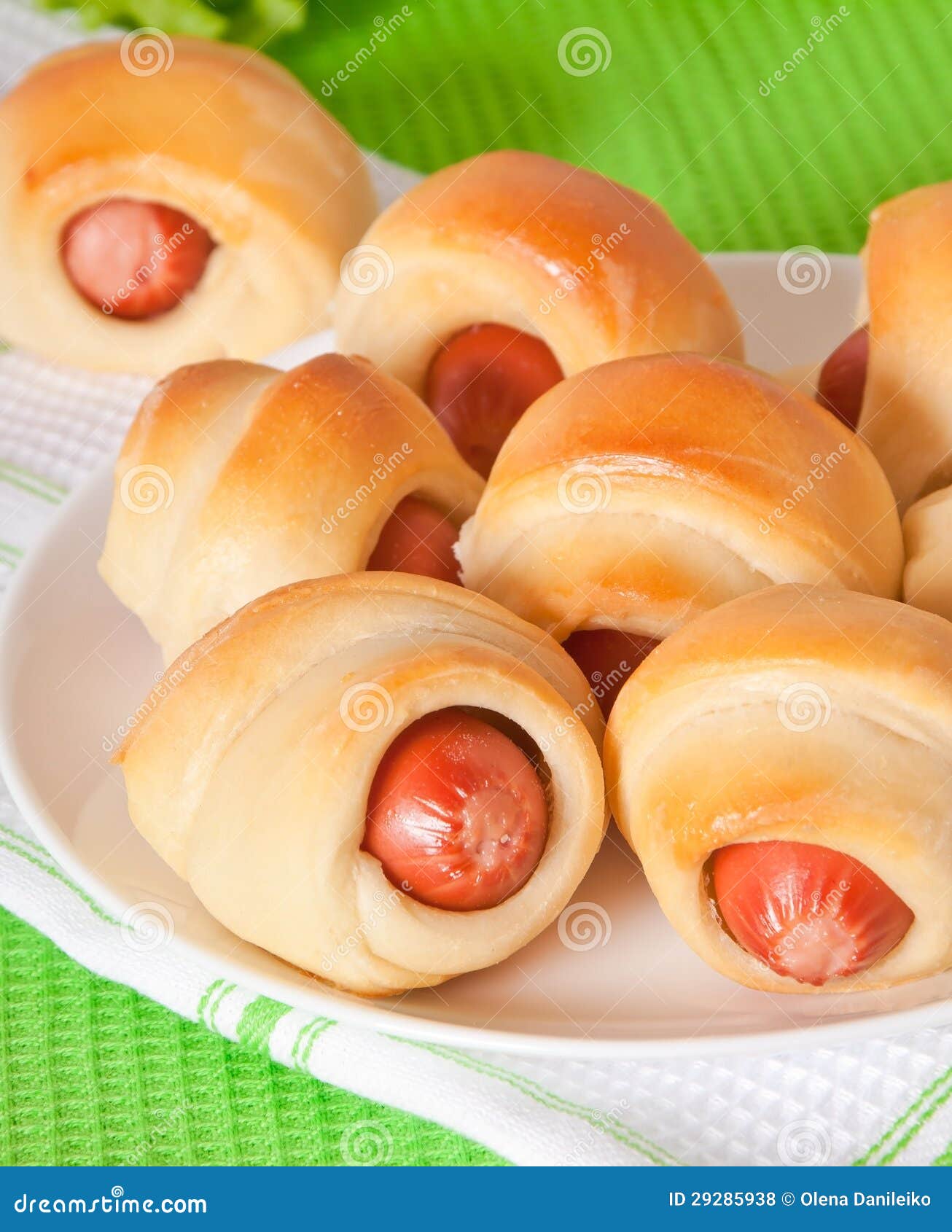 Sausage in the dough stock photo. Image of cooked, green 29285938