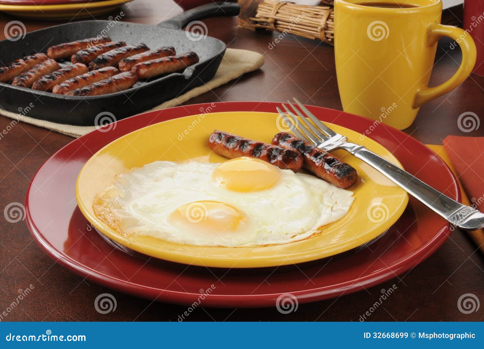 Sausage and eggs stock image. Image of colorful, plates 32668699