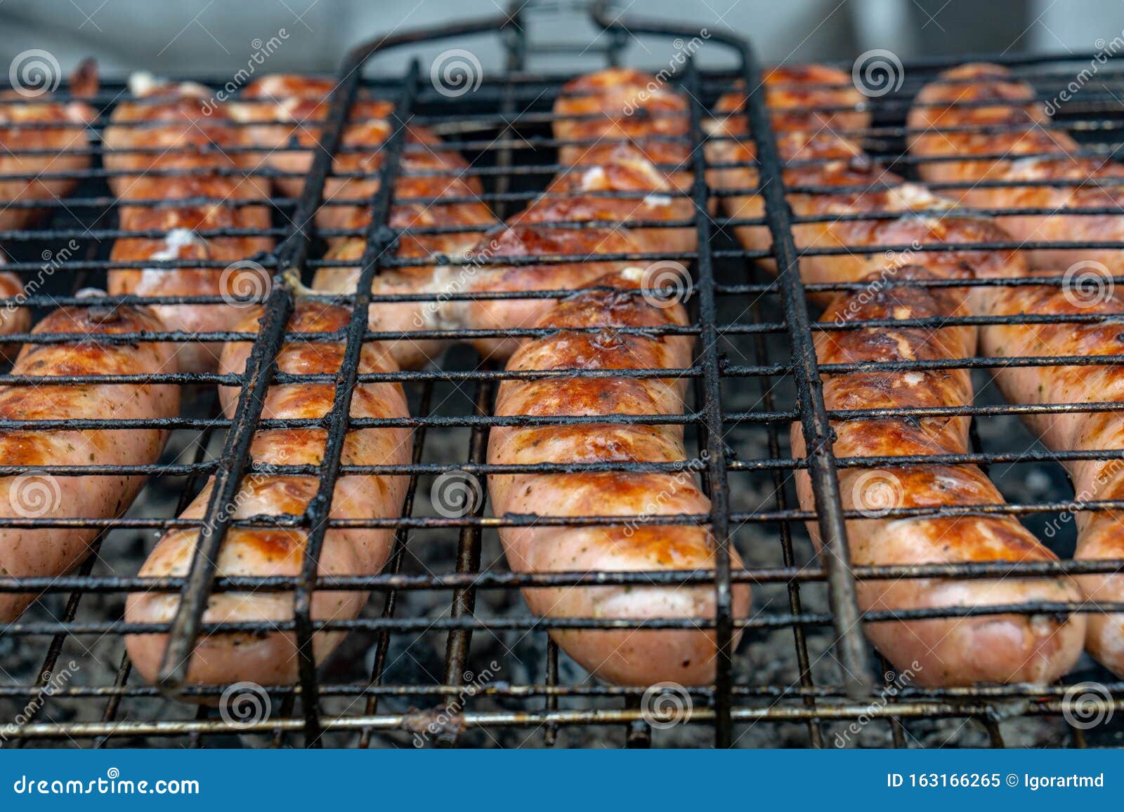 Sausage on the grill stock image. Image of cooking, barbecue 163166265