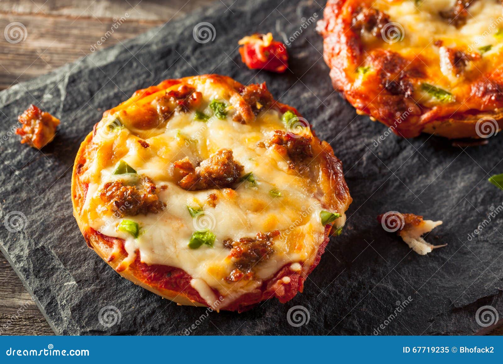 Sausage and Pepper Pizza Bagels Stock Image Image of parmesan, herb