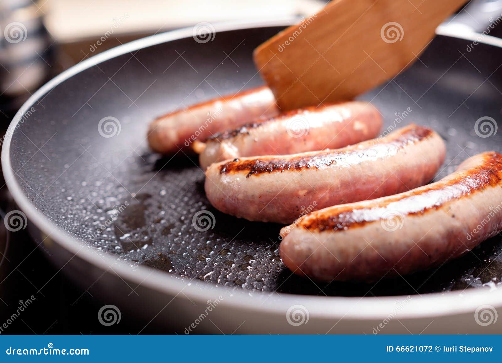 Sausages cooking stock photo. Image of meal, preparation 66621072