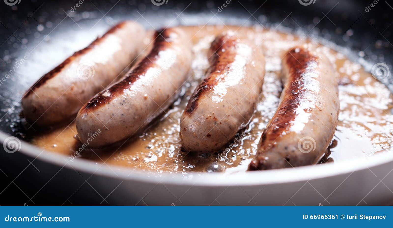 Sausages cooking stock image. Image of sausage, cooking 66966361