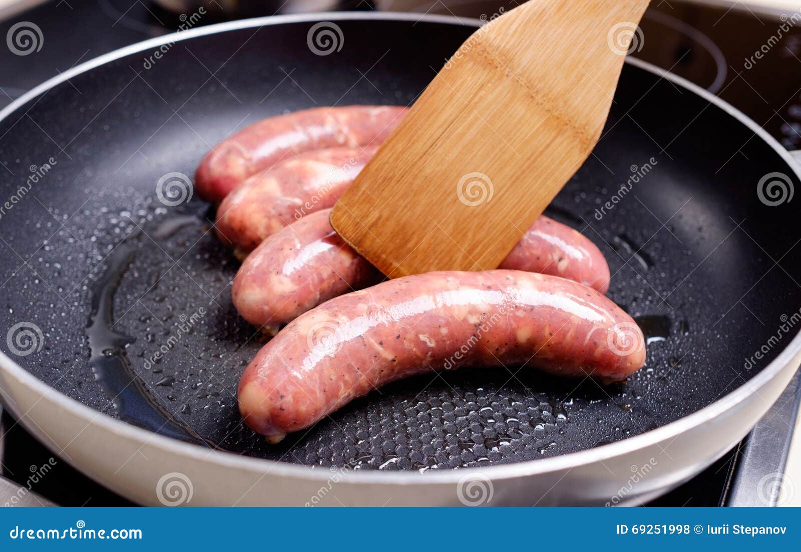 Sausages cooking stock photo. Image of meal, taste, burn 69251998