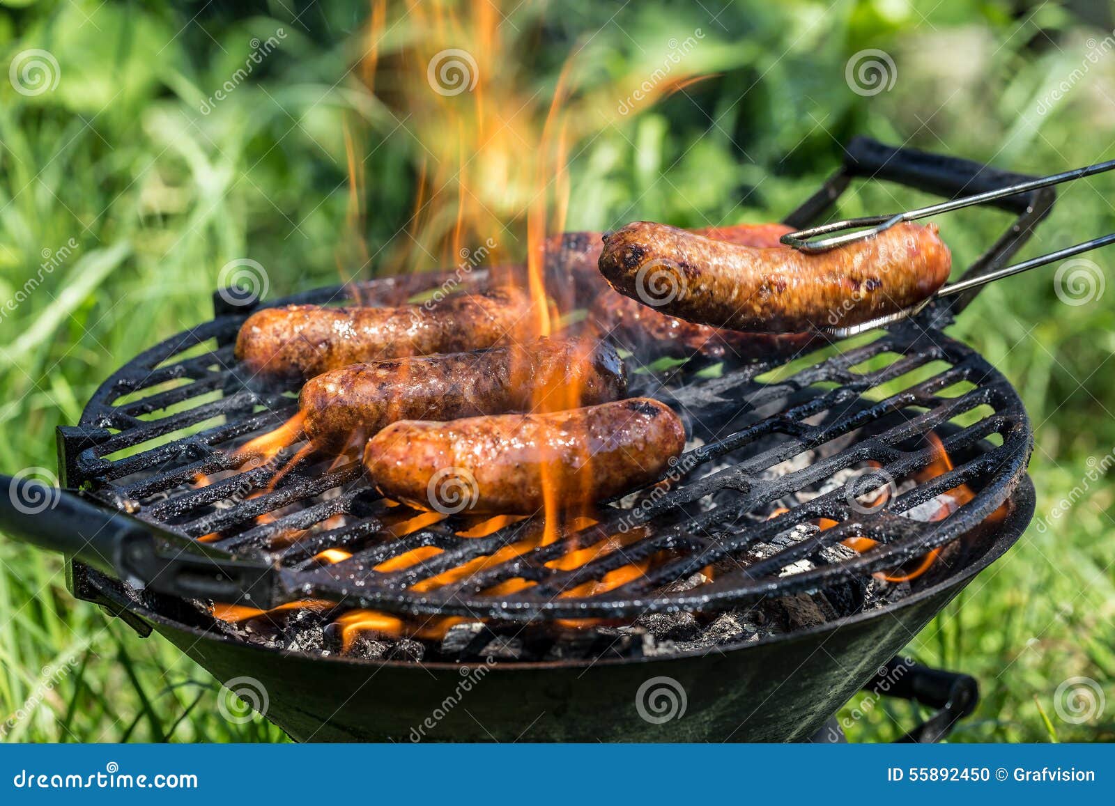 Sausages on the grill stock photo. Image of eating, meat 55892450
